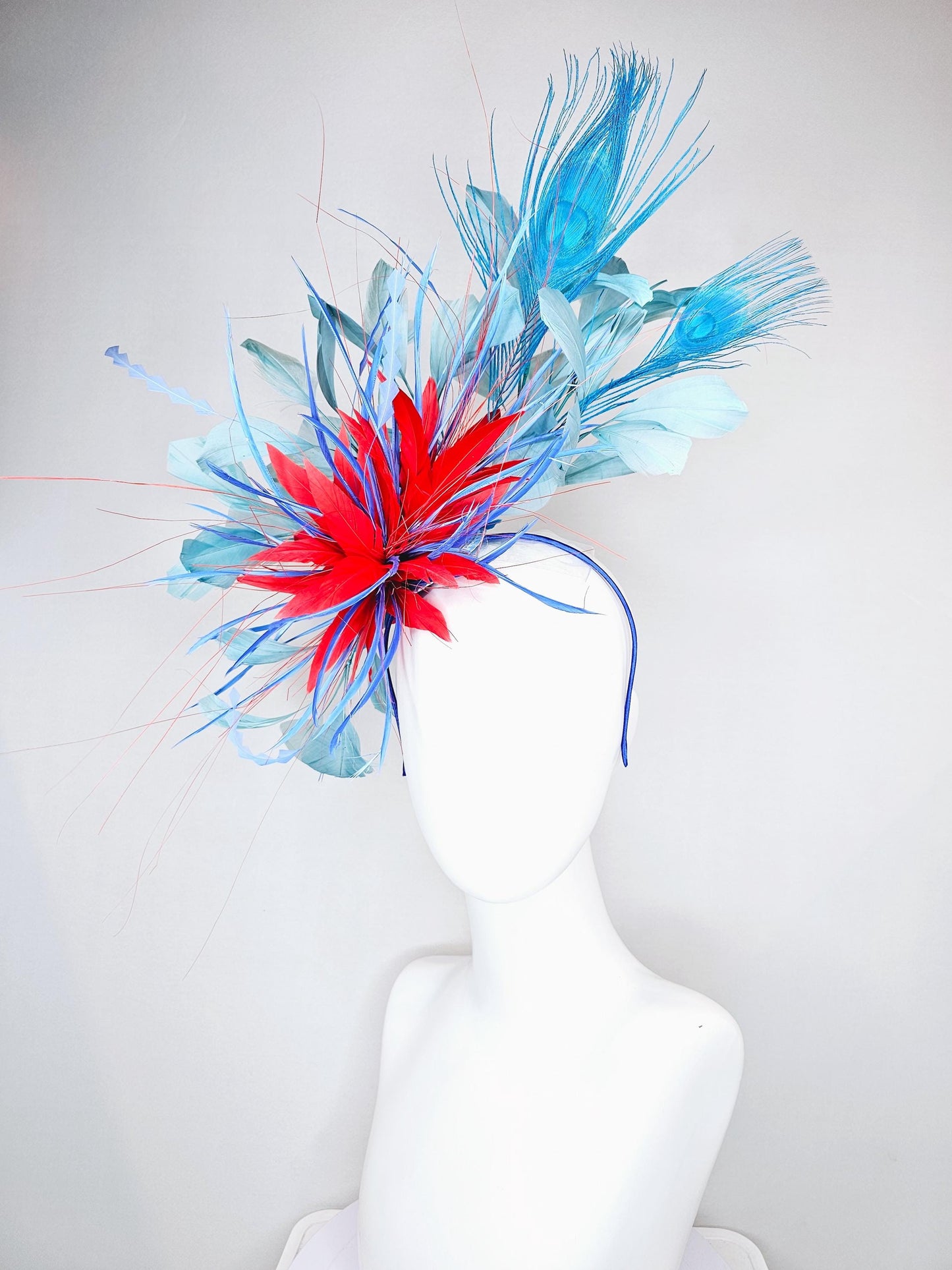 kentucky derby hat fascinator red royal blue feather flower,baby royal blue zigzag feathers, light teal blue and blue peacock feathers