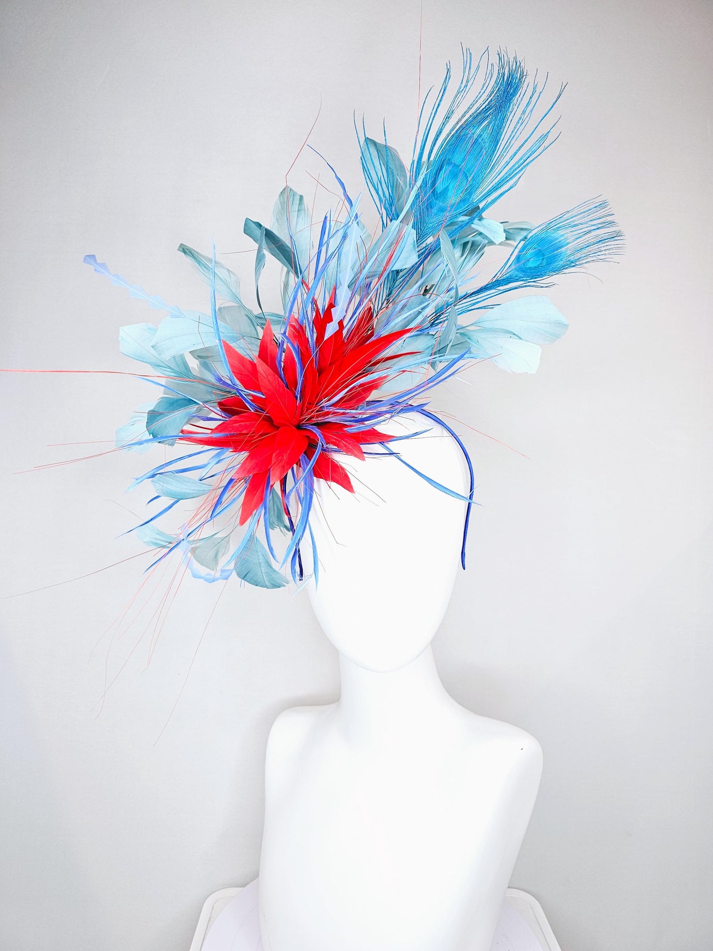 kentucky derby hat fascinator red royal blue feather flower,baby royal blue zigzag feathers, light teal blue and blue peacock feathers