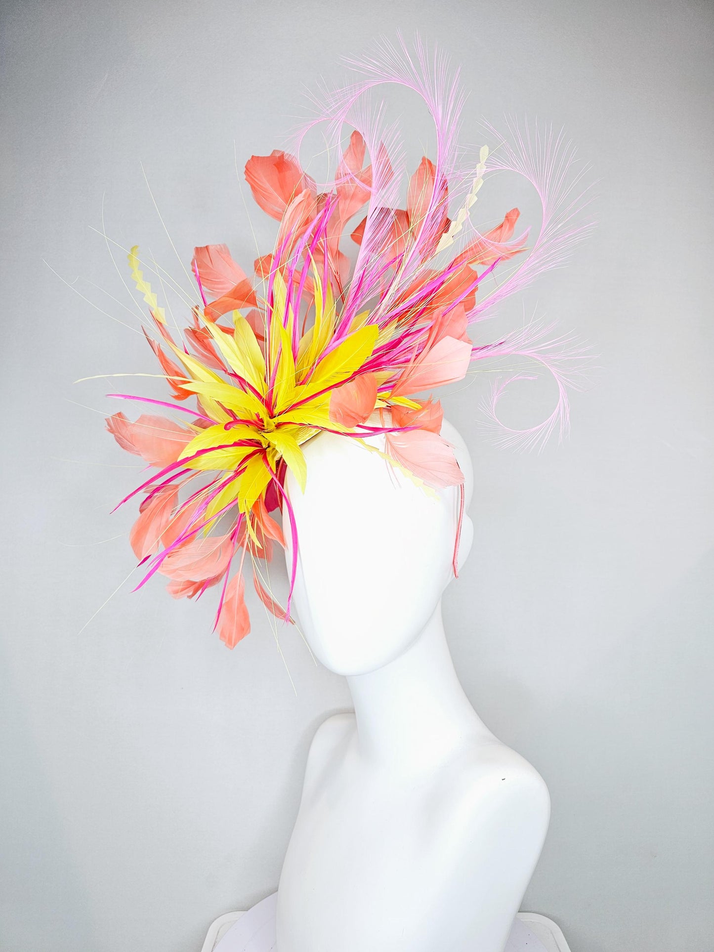 kentucky derby hat fascinator yellow and pink feather flower, yellow zigzag feathers, orange coral peach blush pink feathers