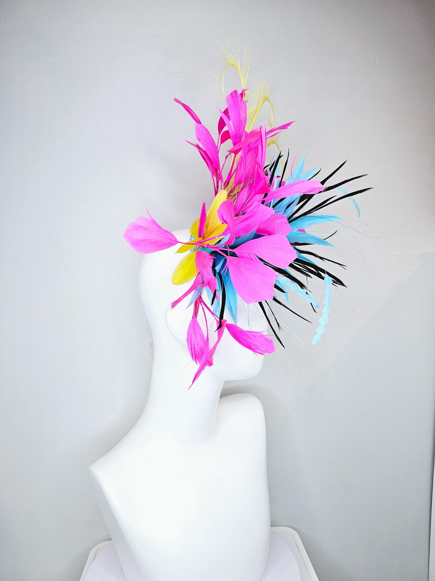 kentucky derby hat fascinator sky blue and black feather flower, zigzag sky blue feathers, yellow pink fuchsia branching feathers