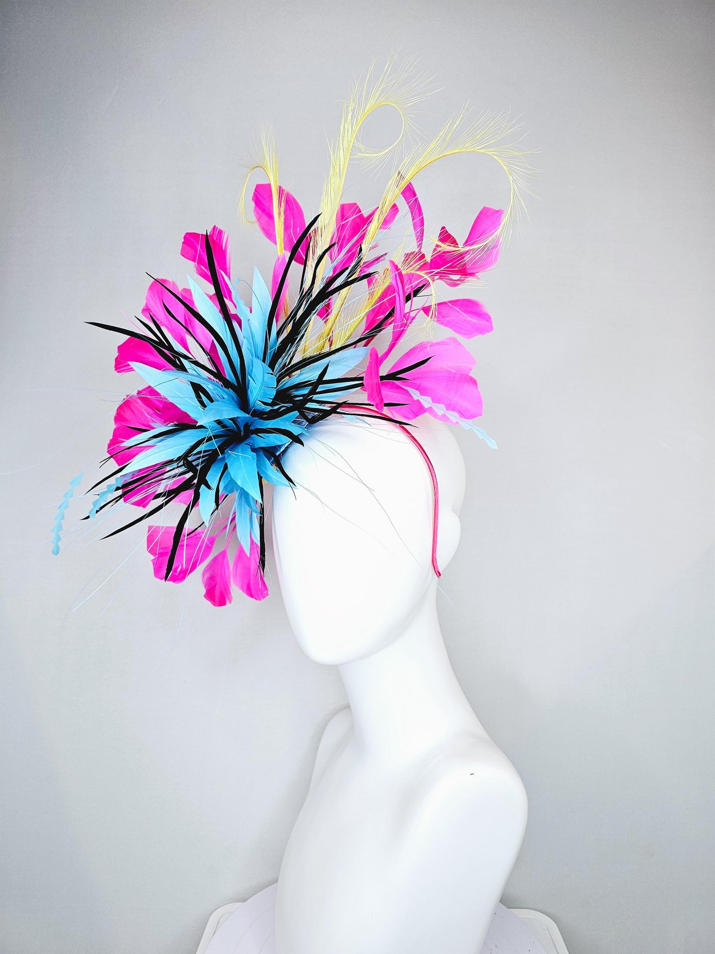 kentucky derby hat fascinator sky blue and black feather flower, zigzag sky blue feathers, yellow pink fuchsia branching feathers