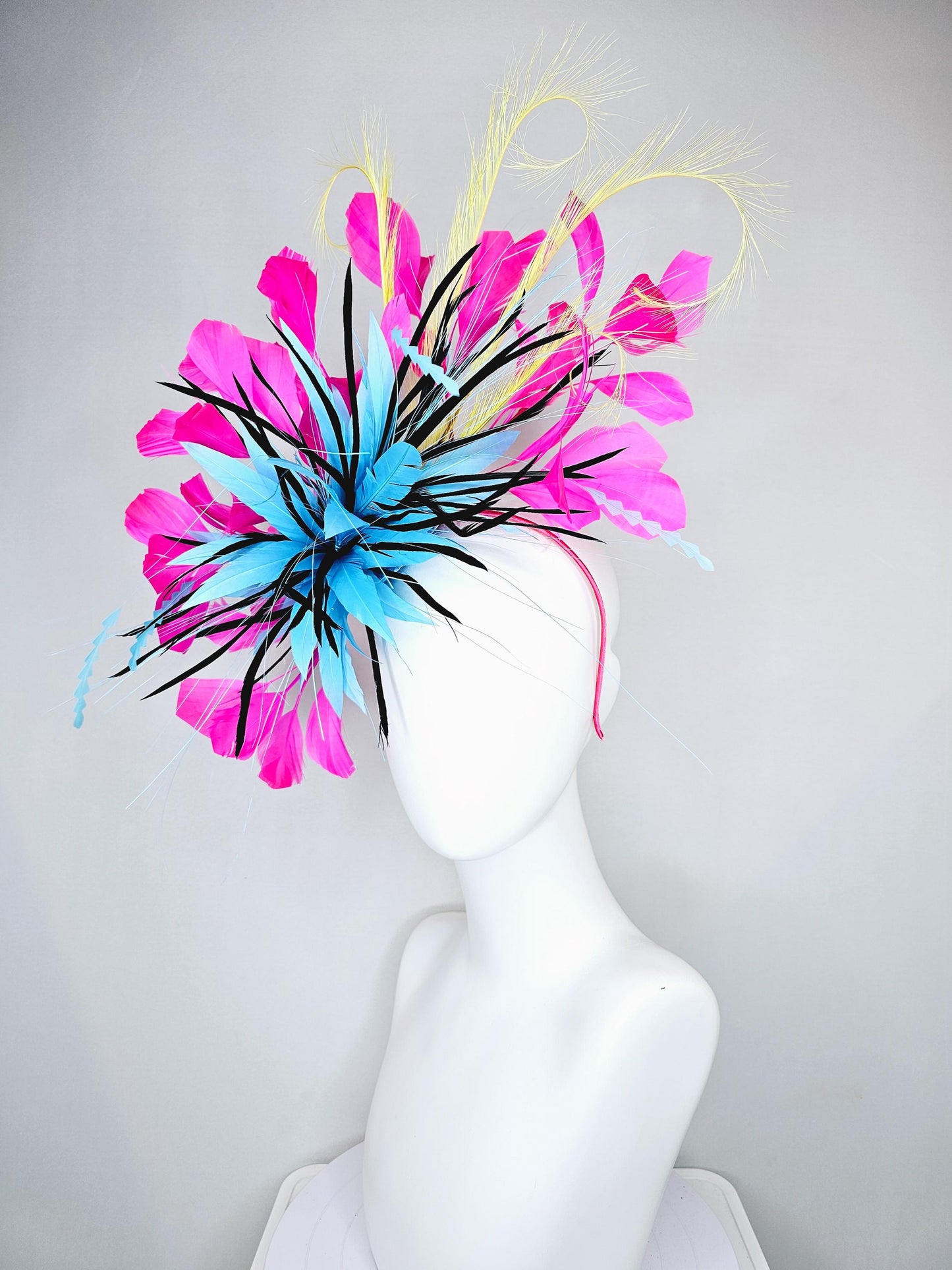 kentucky derby hat fascinator sky blue and black feather flower, zigzag sky blue feathers, yellow pink fuchsia branching feathers