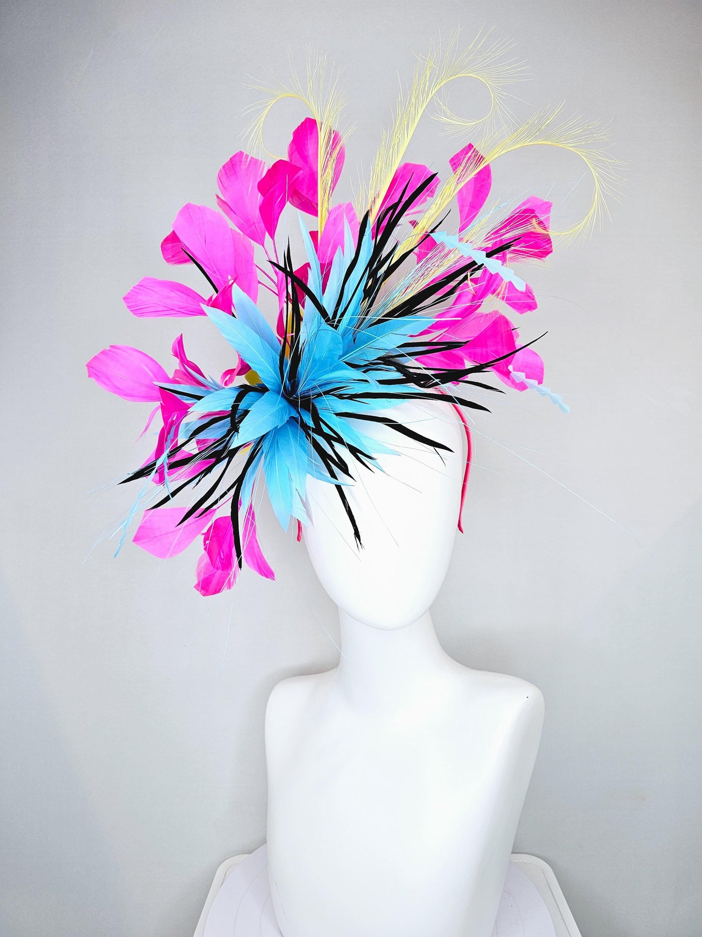 kentucky derby hat fascinator sky blue and black feather flower, zigzag sky blue feathers, yellow pink fuchsia branching feathers