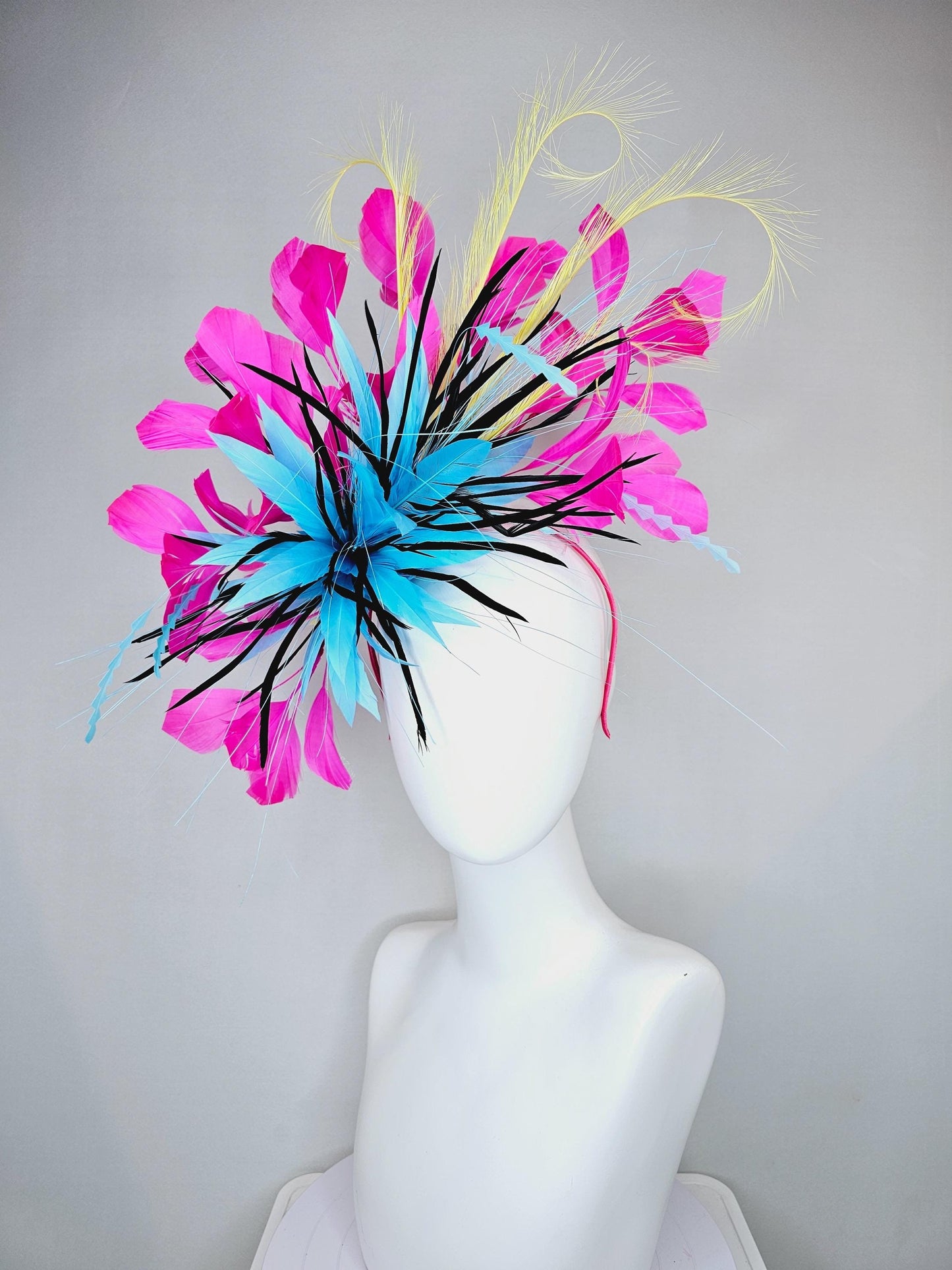 kentucky derby hat fascinator sky blue and black feather flower, zigzag sky blue feathers, yellow pink fuchsia branching feathers