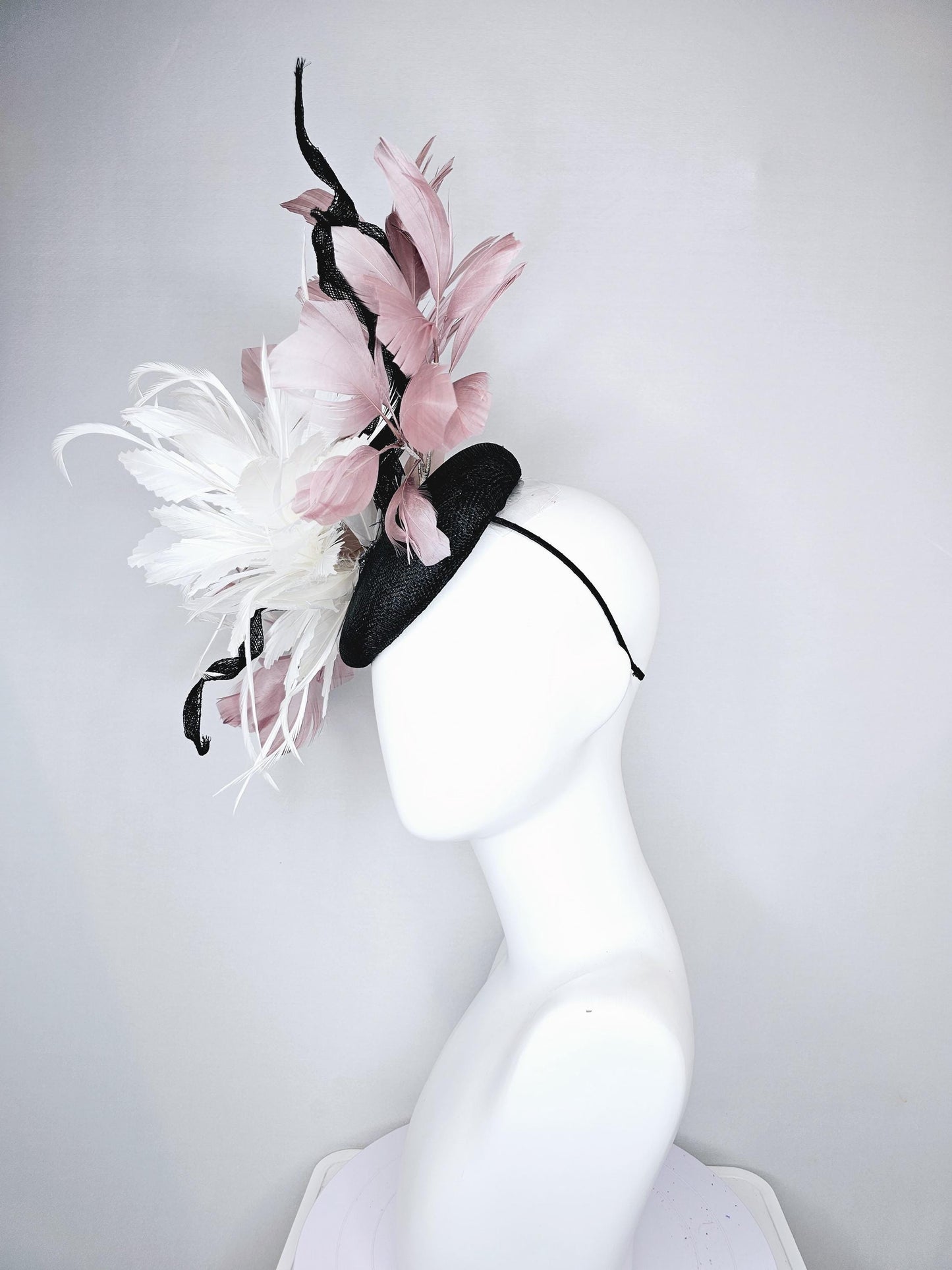 kentucky derby hat fascinator black sinamay with curls and beige neutral blush pink branching feathers with large white feather flower