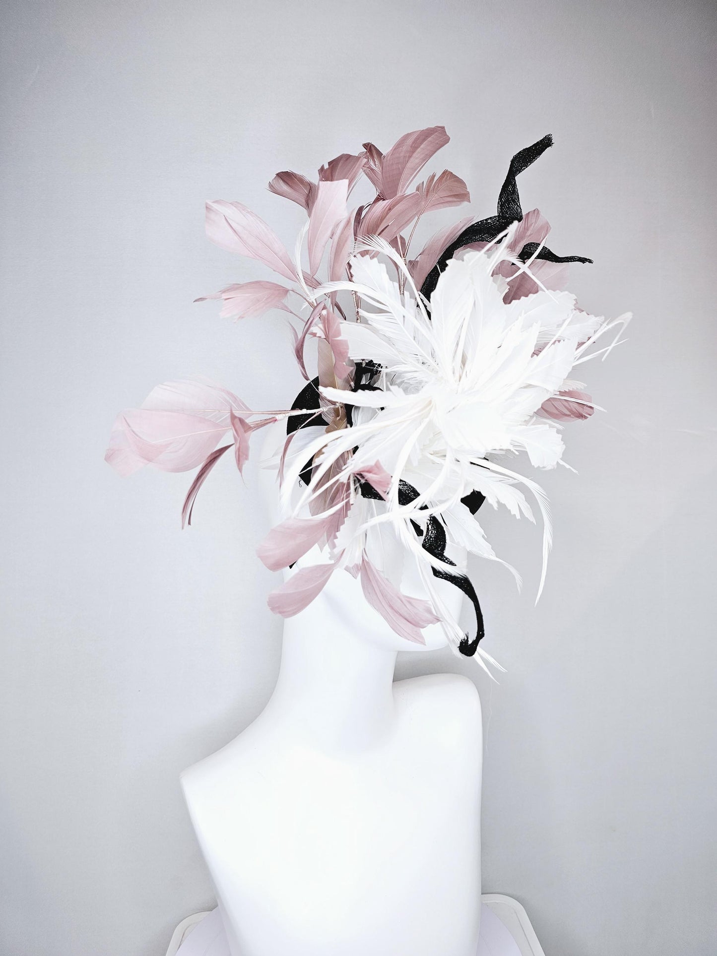 kentucky derby hat fascinator black sinamay with curls and beige neutral blush pink branching feathers with large white feather flower