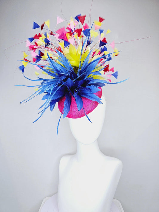 kentucky derby hat fascinator hot pink sinamay with large royal blue feather flower,branching colorful rainbow yellow,blue,red,pink feathers