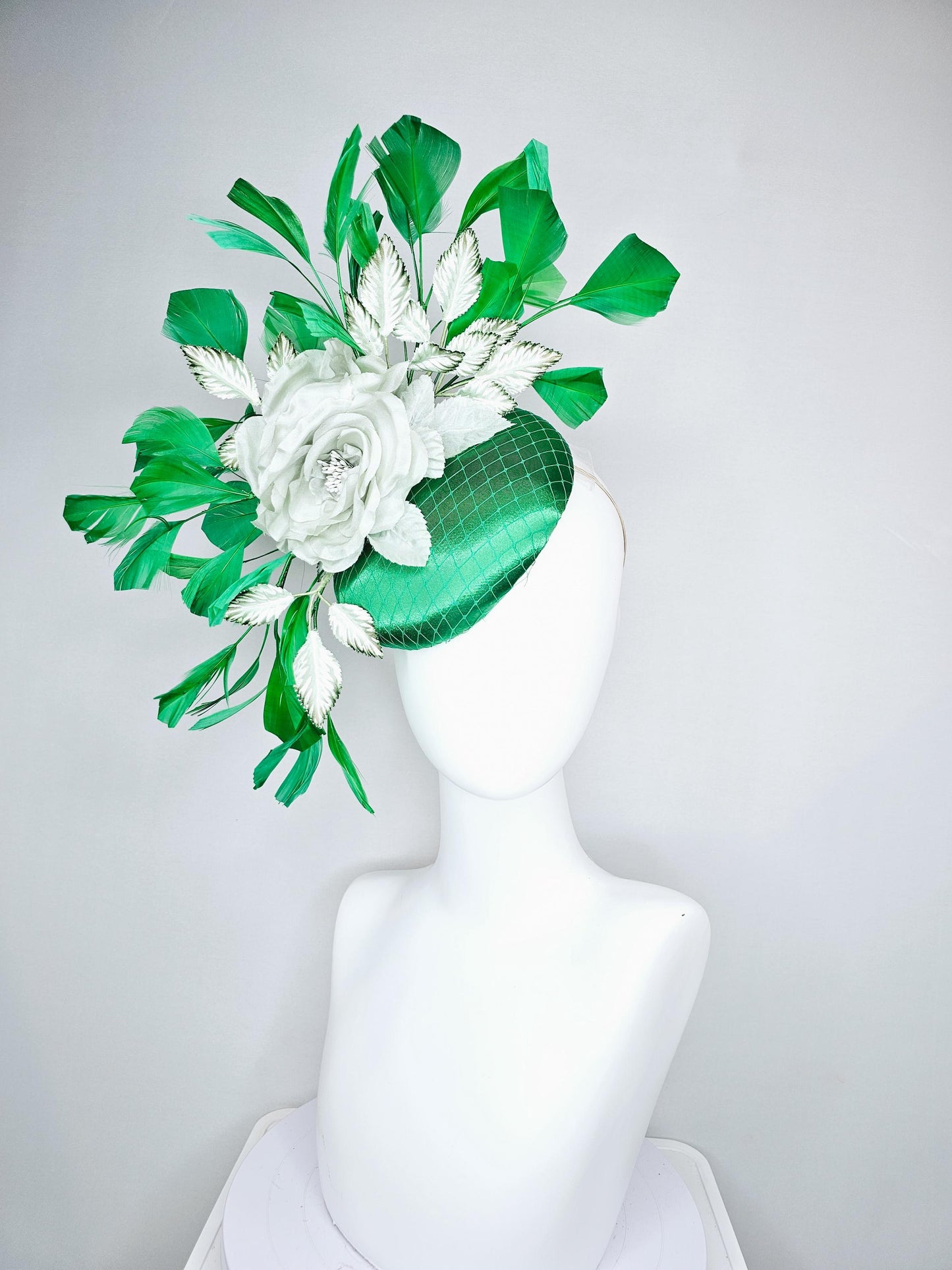 kentucky derby hat fascinator with emerald green satin with netting and mint light green satin silk rose flowers, green branching feathers