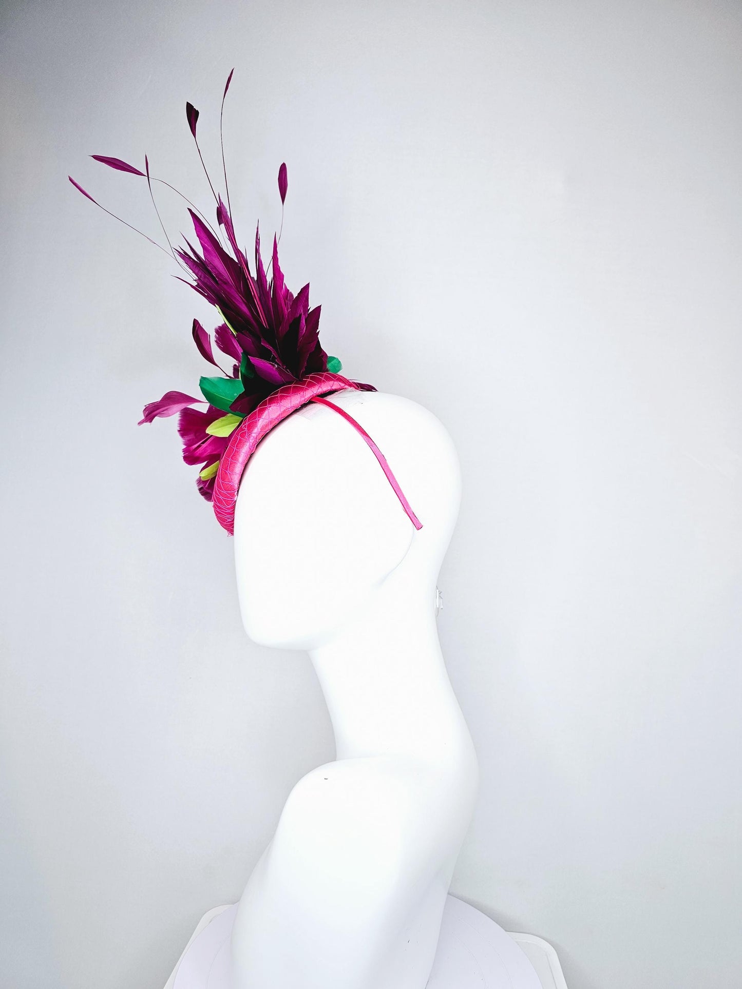 kentucky derby hat fascinator hot pink satin with netting,magenta purple branching feathers and lime green,blue green aqua,pink feathers