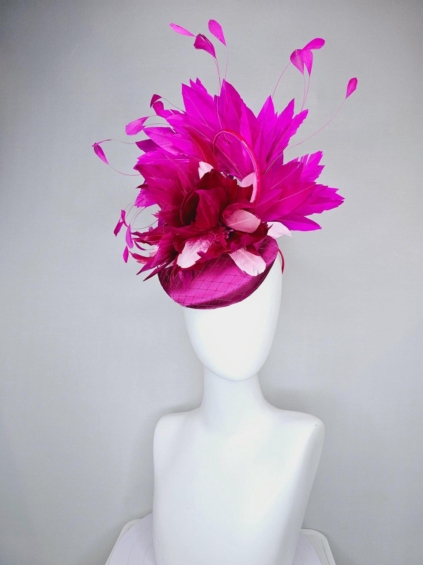 kentucky derby hat fascinator fuchsia hot pink satin with netting, dark and light pink feather flower with fuchsia pink branching feathers