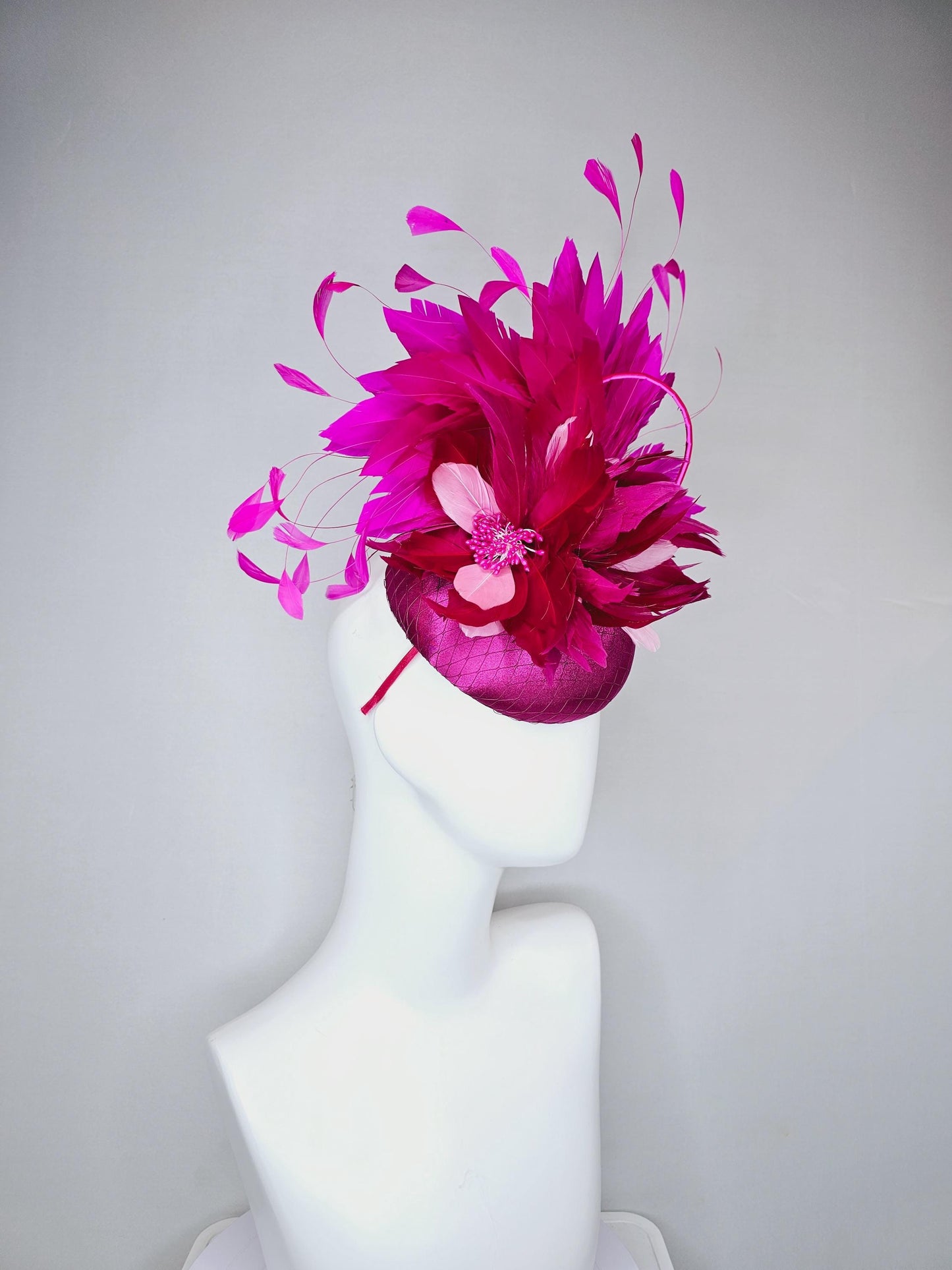 kentucky derby hat fascinator fuchsia hot pink satin with netting, dark and light pink feather flower with fuchsia pink branching feathers