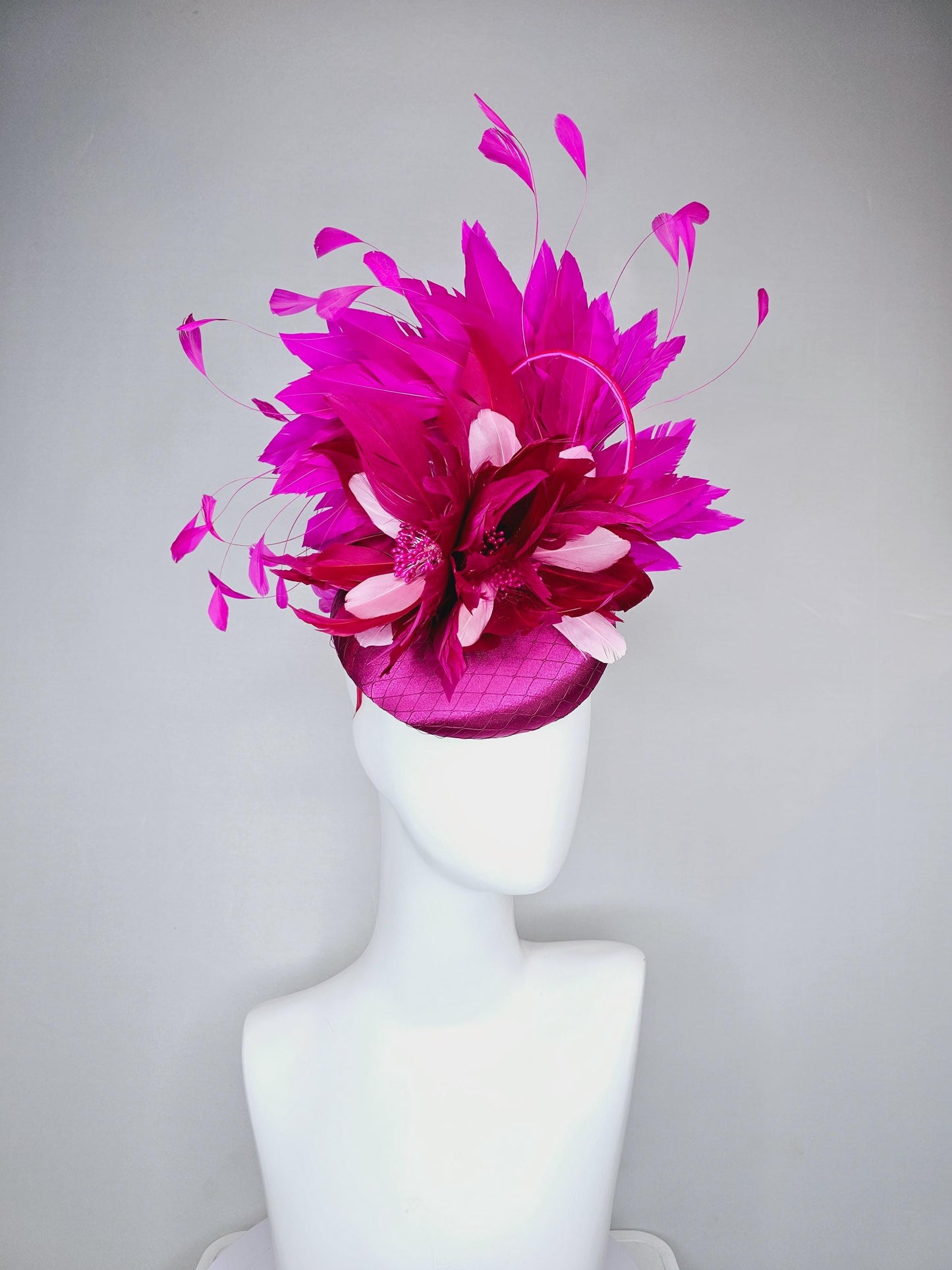 kentucky derby hat fascinator fuchsia hot pink satin with netting, dark and light pink feather flower with fuchsia pink branching feathers