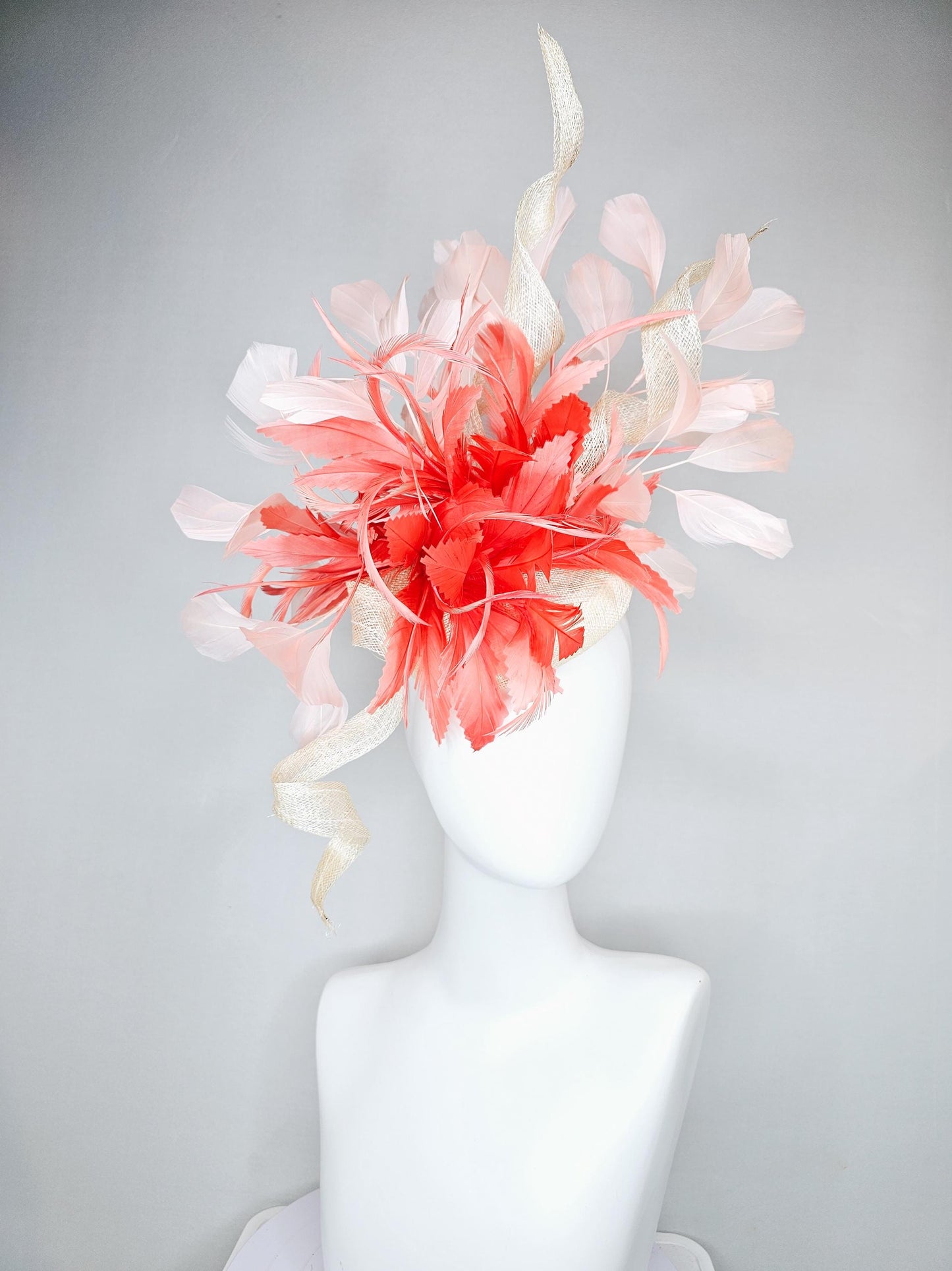 kentucky derby hat fascinator ivory white sinamay with curls,and coral feather flower with light pink branching feathers