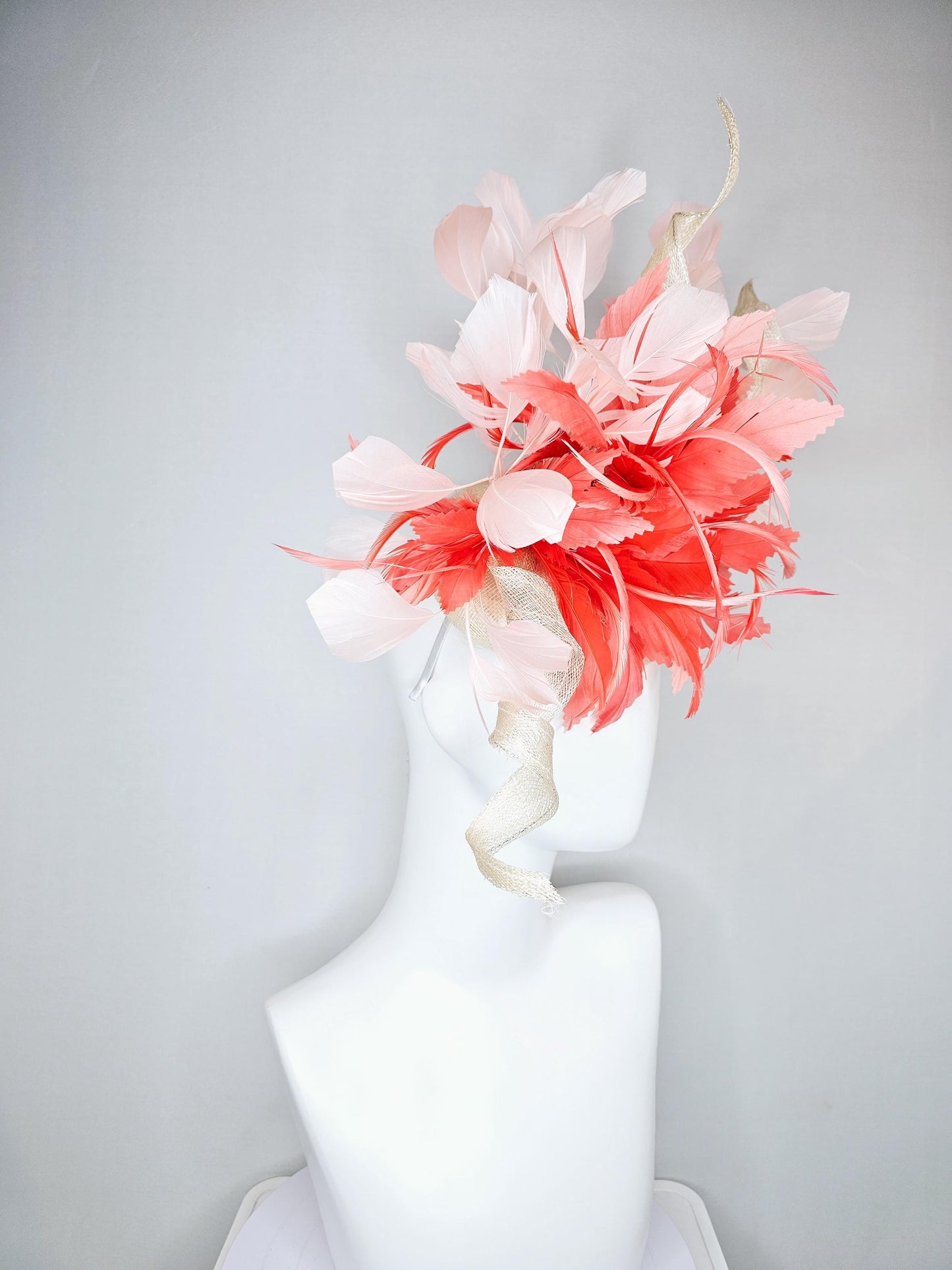 kentucky derby hat fascinator ivory white sinamay with curls,and coral feather flower with light pink branching feathers