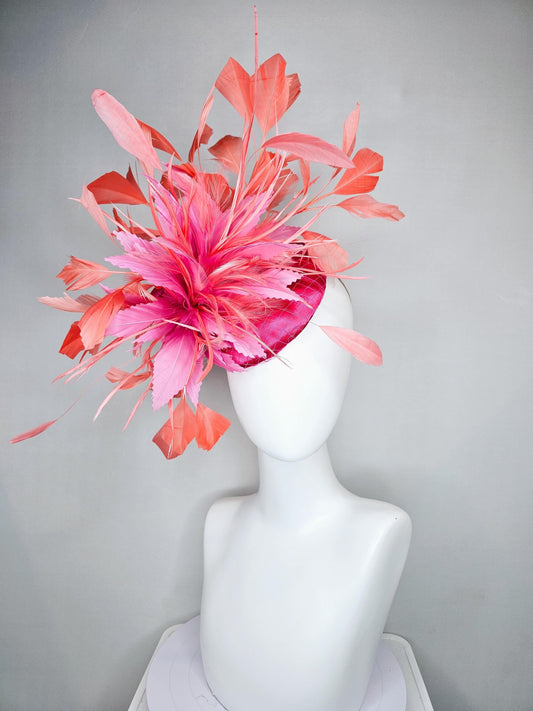 kentucky derby hat fascinator hot pink satin with netting,and light pink feather flowers with coral orange peach branching feathers