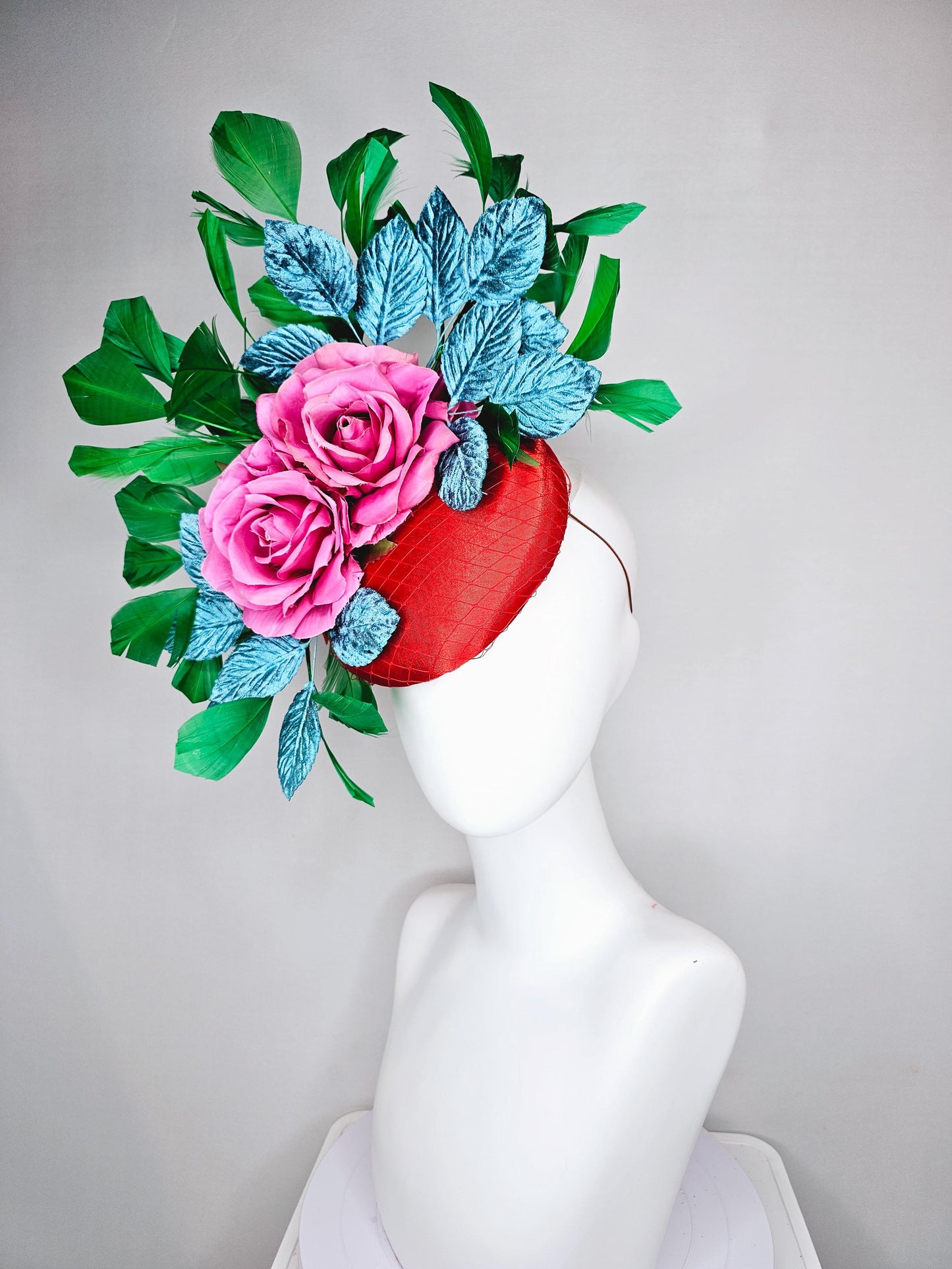 kentucky derby hat fascinator bright red satin with netting,pink satin roses,turquoise blue velvet leaves,emerald green branching feathers