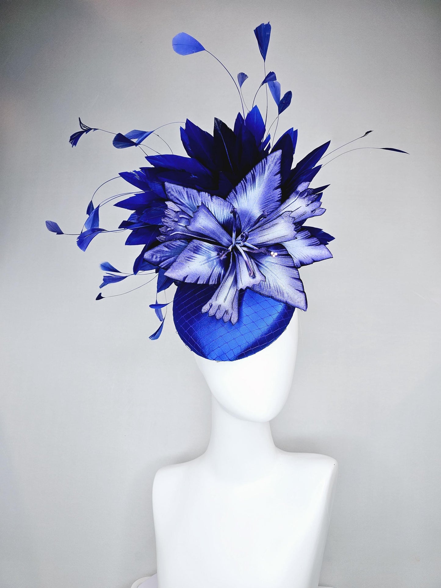 kentucky derby hat fascinator royal blue satin with netting,large ombre light blue satin flower, and midnight navy blue branching feathers