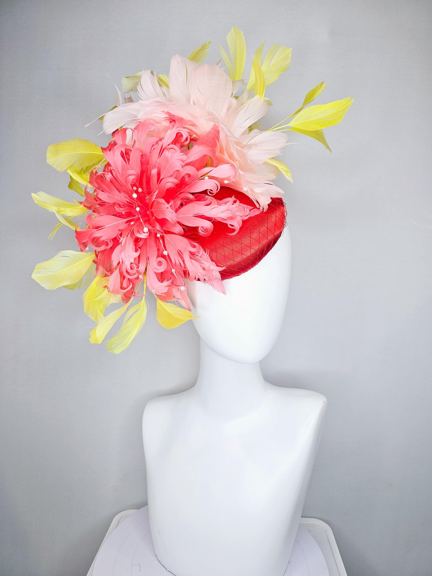 kentucky derby hat fascinator bright red satin with netting,large coral curly feather flower w/ pearl strings,yellow and light pink feathers