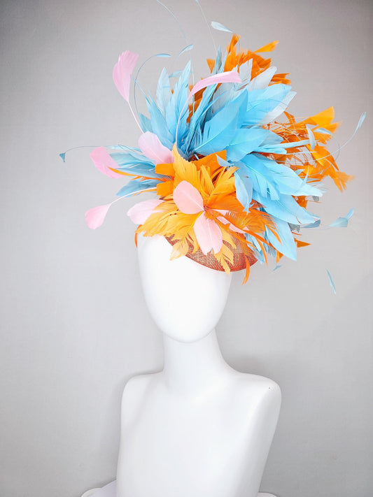 kentucky derby hat fascinator orange sinamay with bright orange, sky blue and light pink branching feathers