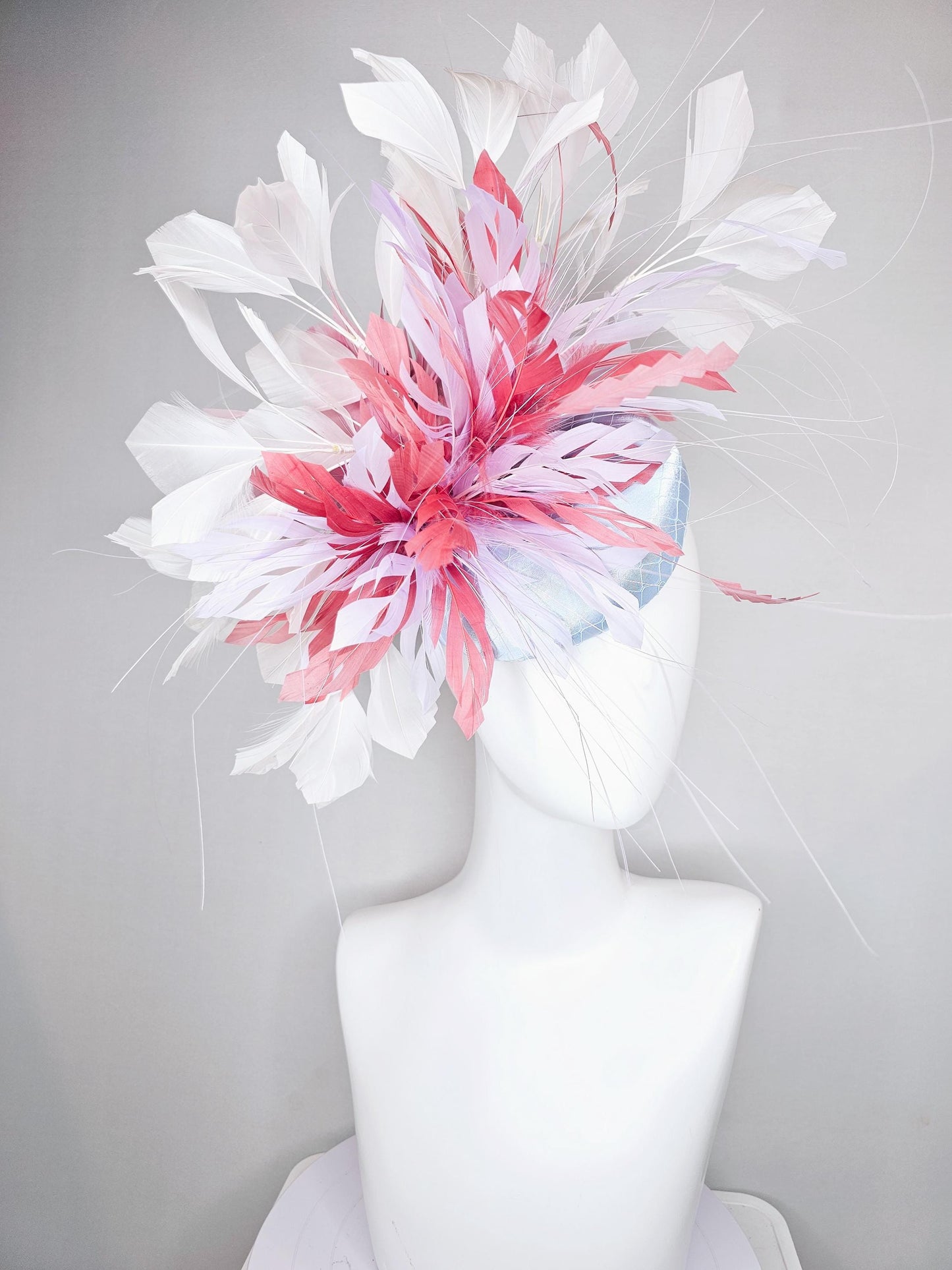 kentucky derby hat fascinator light baby blue satin with netting with blush pink,white,and light purple branching feathers