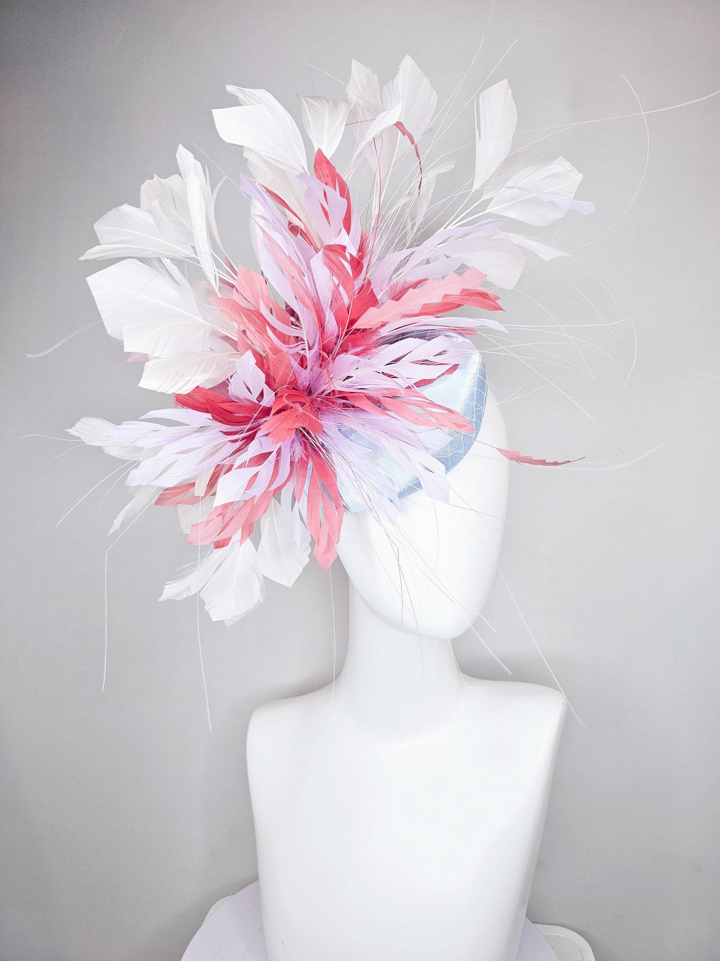 kentucky derby hat fascinator light baby blue satin with netting with blush pink,white,and light purple branching feathers