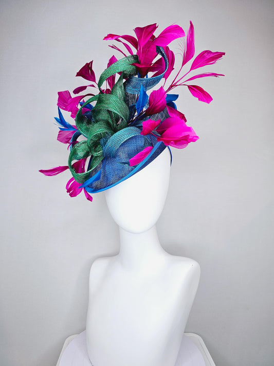 kentucky derby hat fascinator royal blue sinamay saucer with bright fuchsia hot pink branching feathers and green and blue sinamay curls