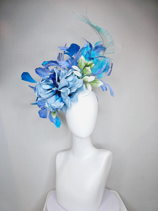 kentucky derby hat fascinator blue teal ombre flower with branching royal blue turquoise and light blue feathers and green velvet leaves