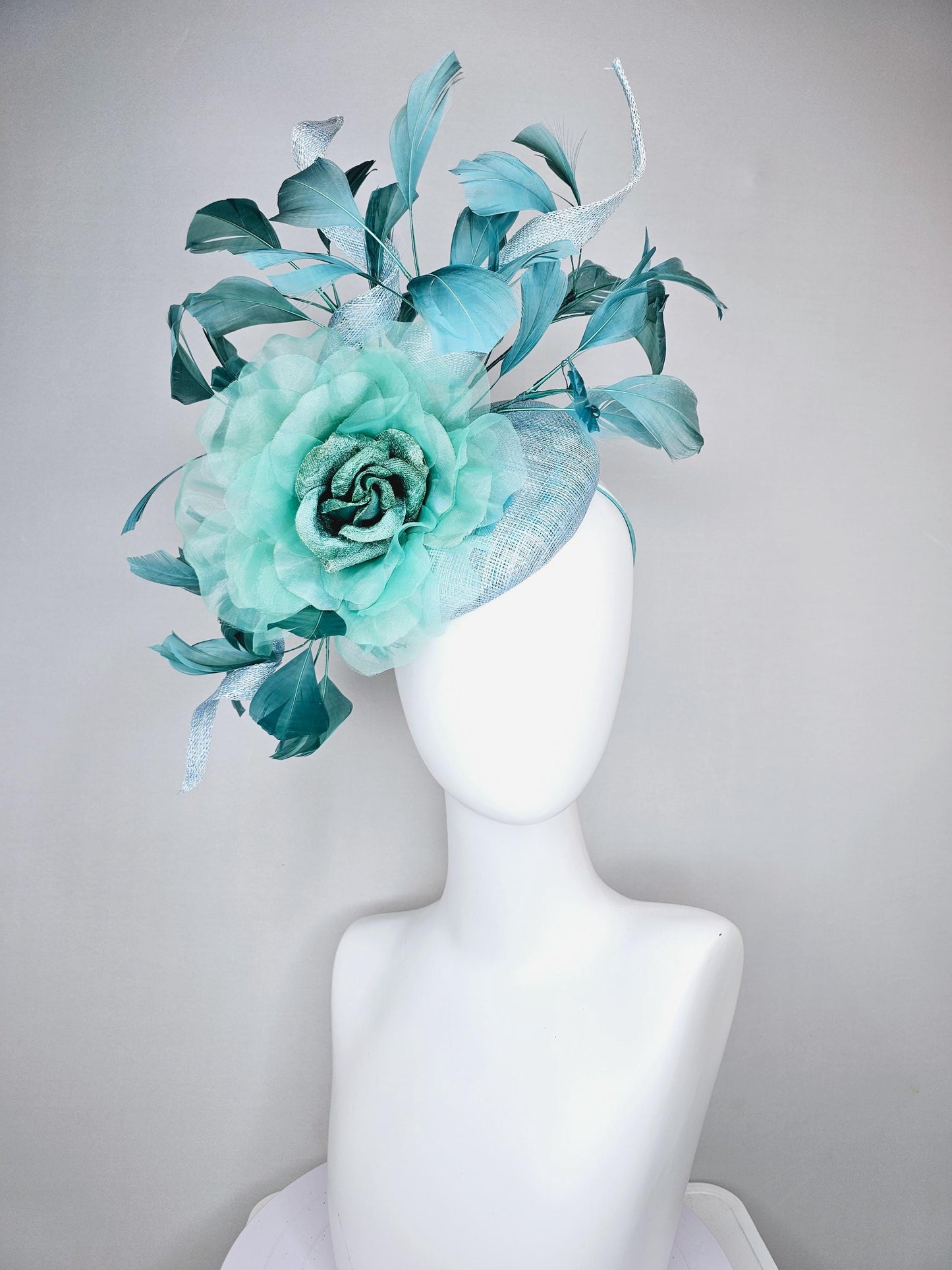 kentucky derby hat fascinator light blue sinamay with mint green large organza satin flower and teal blue branching feathers