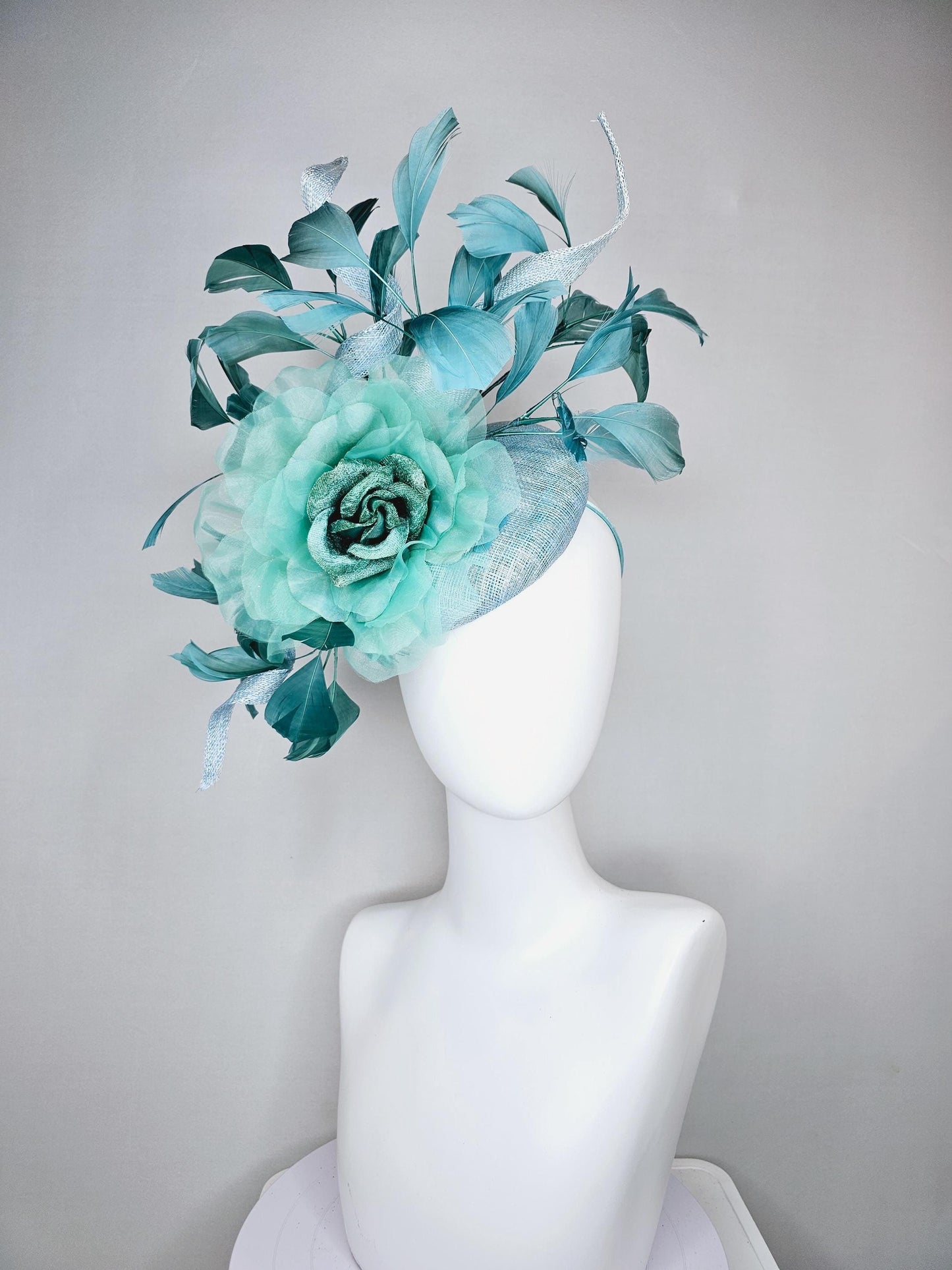 kentucky derby hat fascinator light blue sinamay with mint green large organza satin flower and teal blue branching feathers