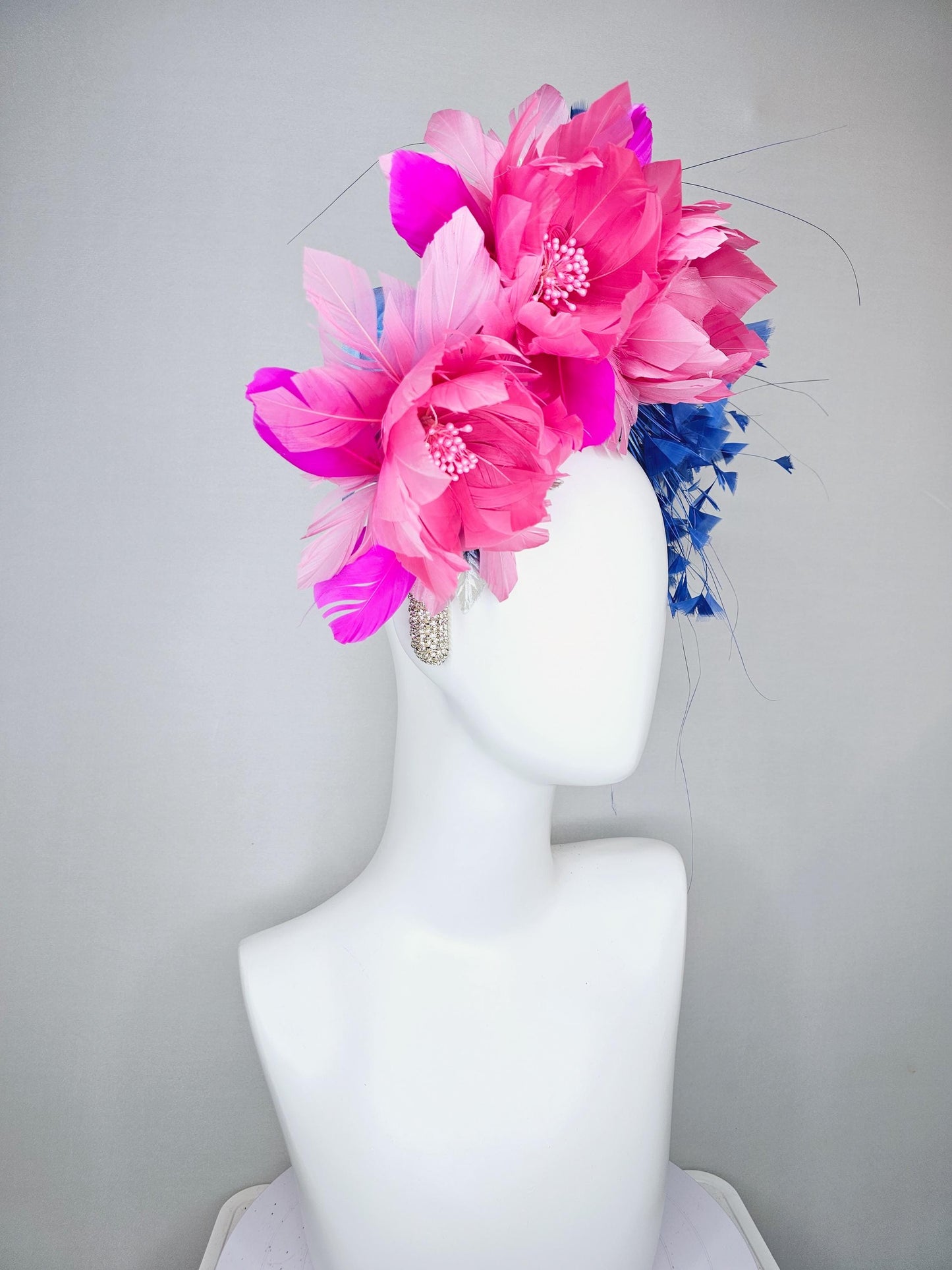 kentucky derby hat fascinator rhinestone crystal headband with branching royal blue feathers and pink feathers flowers with purple feathers