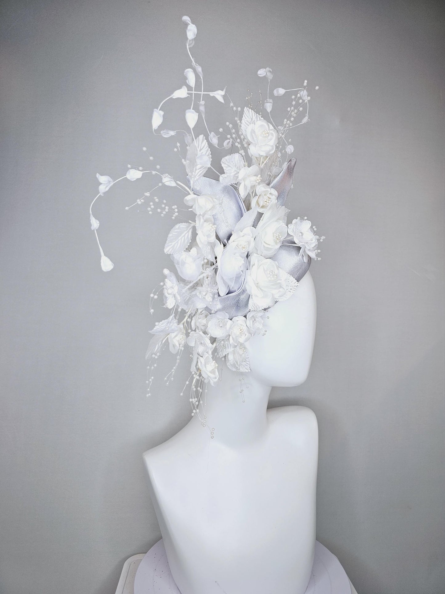 kentucky derby hat fascinator silver gray satin with ivory white satin flowers, white velvet leaves with decorative pearl strings