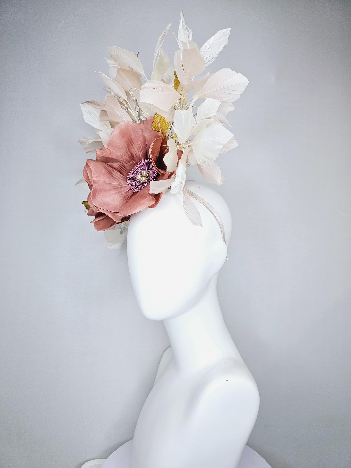 kentucky derby hat fascinator dusty rose gold pink flowers with pearls core and gold leaves, tear drop crystals stems and ivory feathers