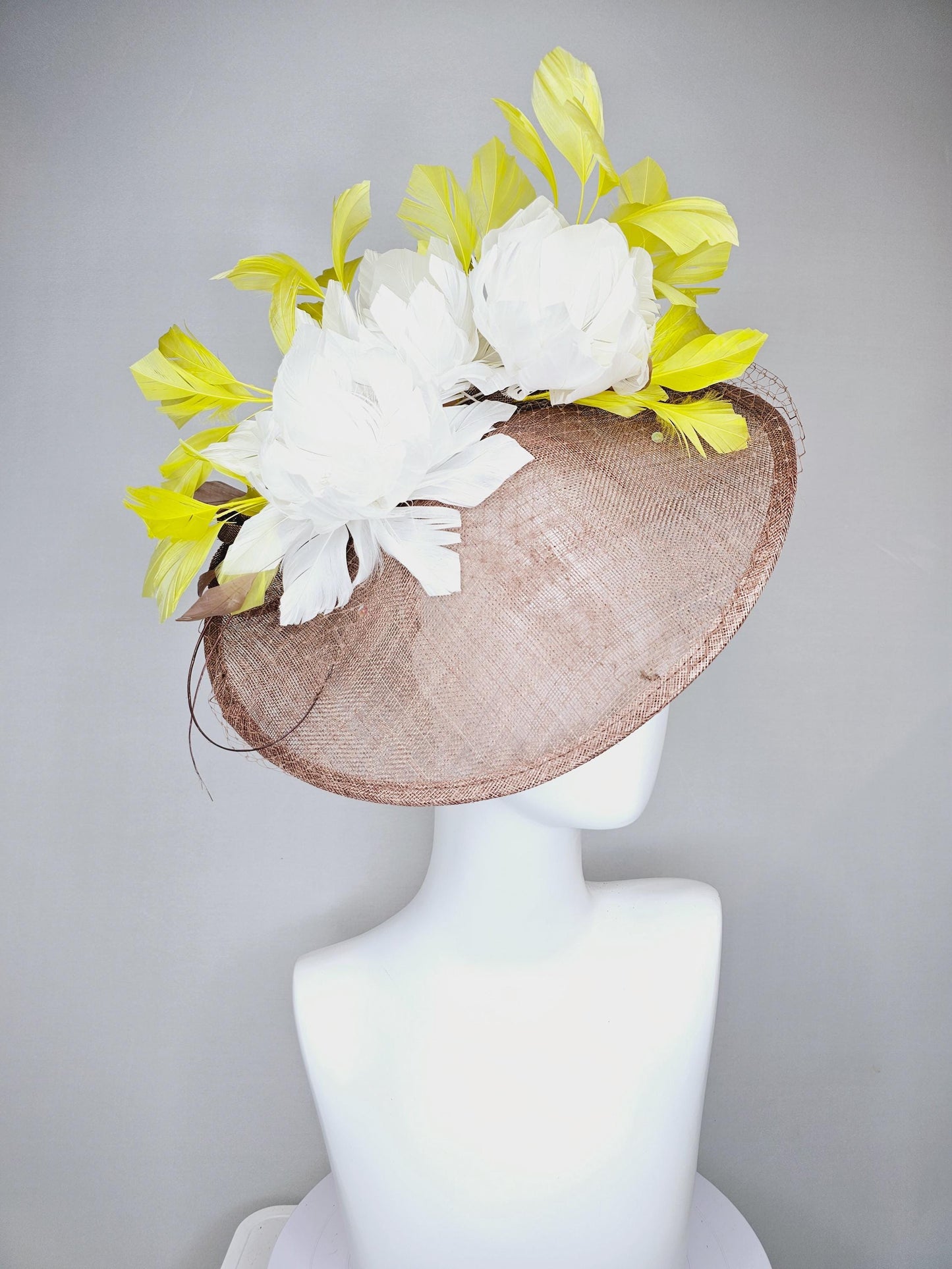 kentucky derby hat fascinator taupe brown sinamay saucer with netting, white fluffy feather flowers and yellow branching feathers