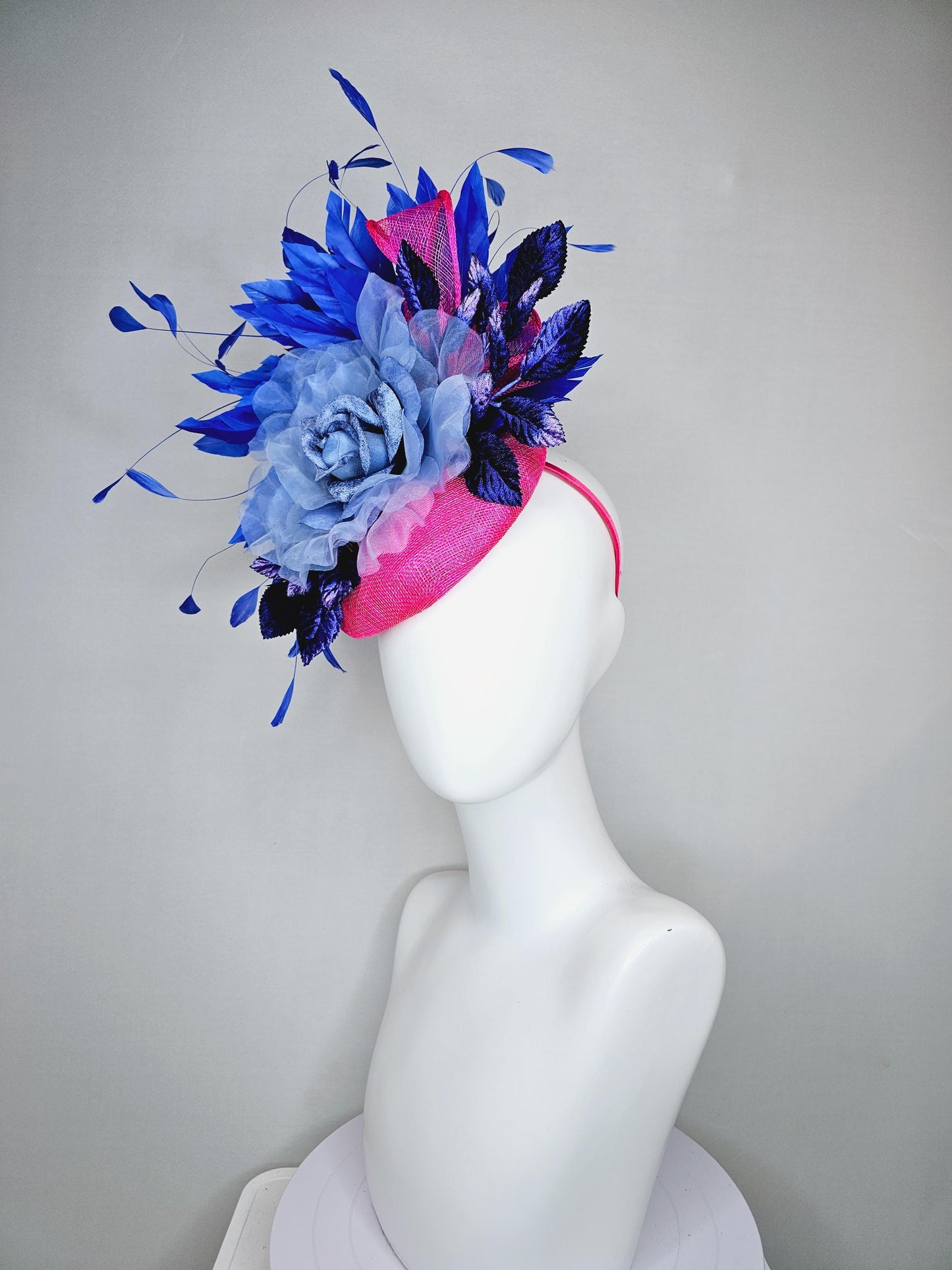 kentucky derby hat fascinator bright hot pink sinamay,light blue organza flower,branching royal blue feathers and blue ombre velvet leaves