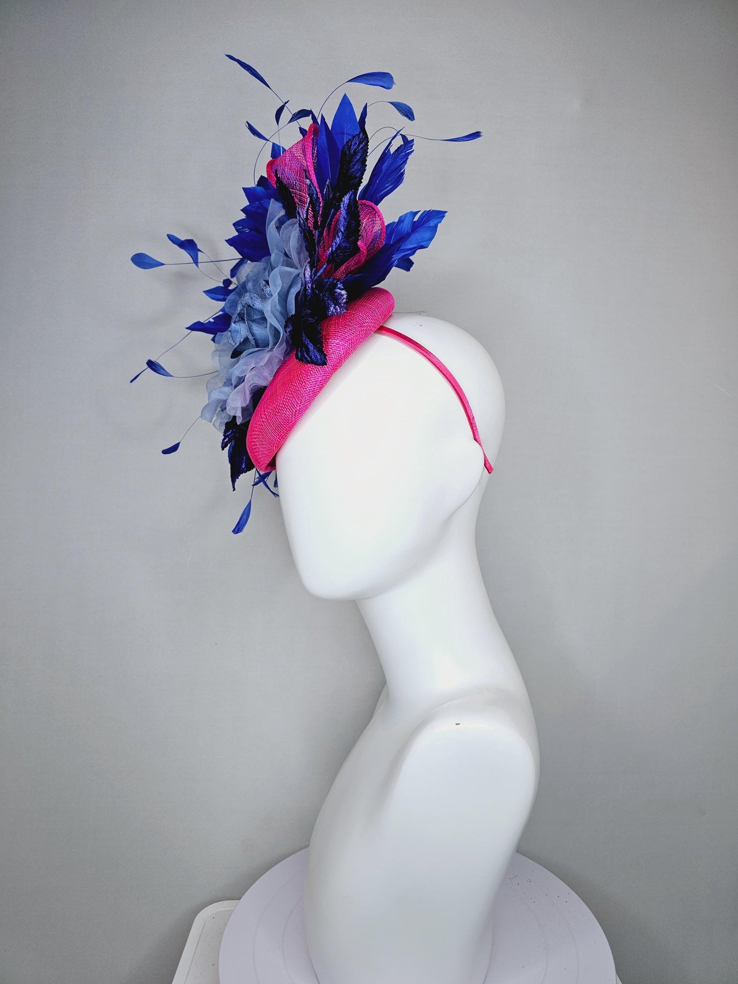 kentucky derby hat fascinator bright hot pink sinamay,light blue organza flower,branching royal blue feathers and blue ombre velvet leaves