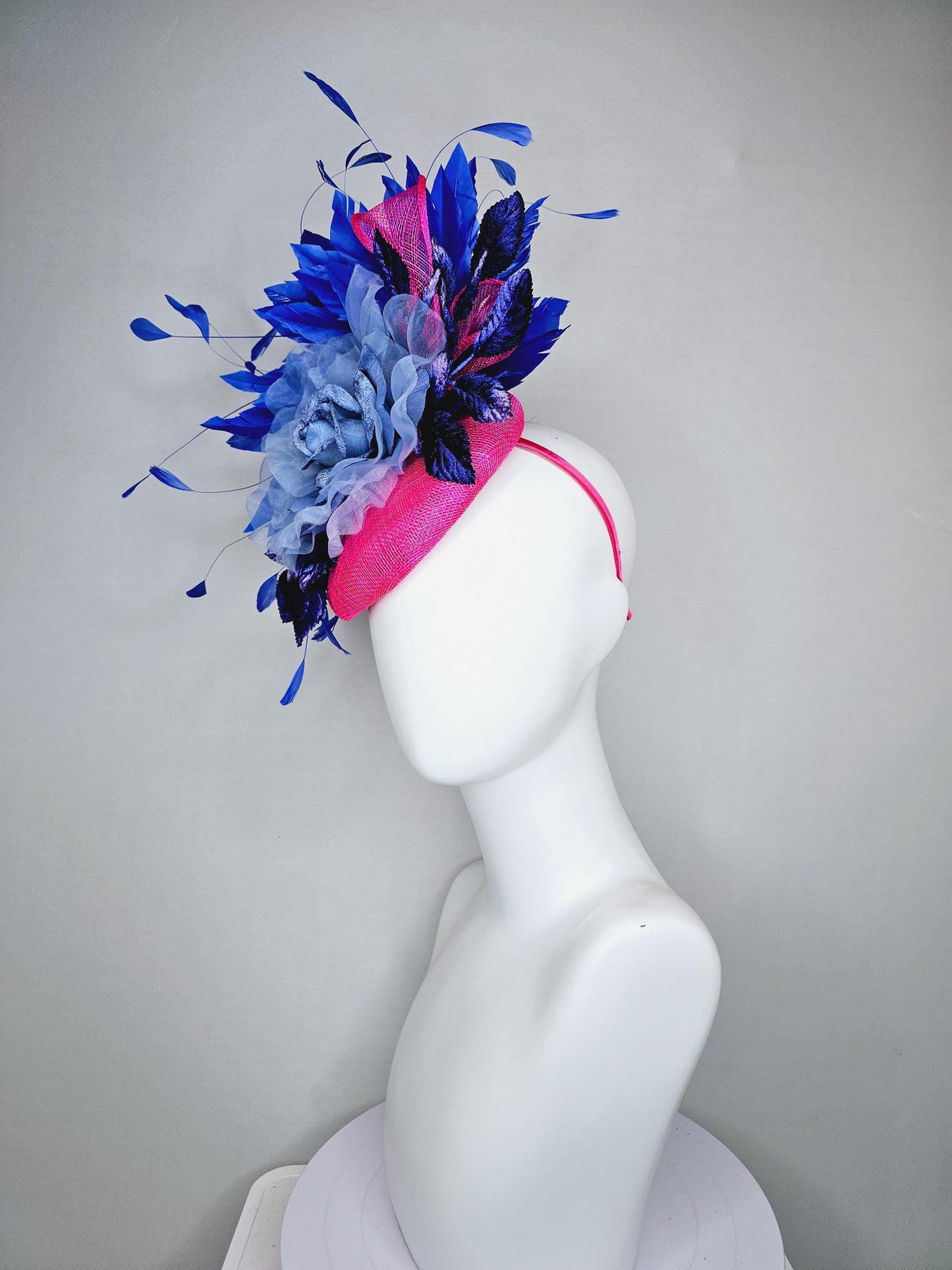 kentucky derby hat fascinator bright hot pink sinamay,light blue organza flower,branching royal blue feathers and blue ombre velvet leaves