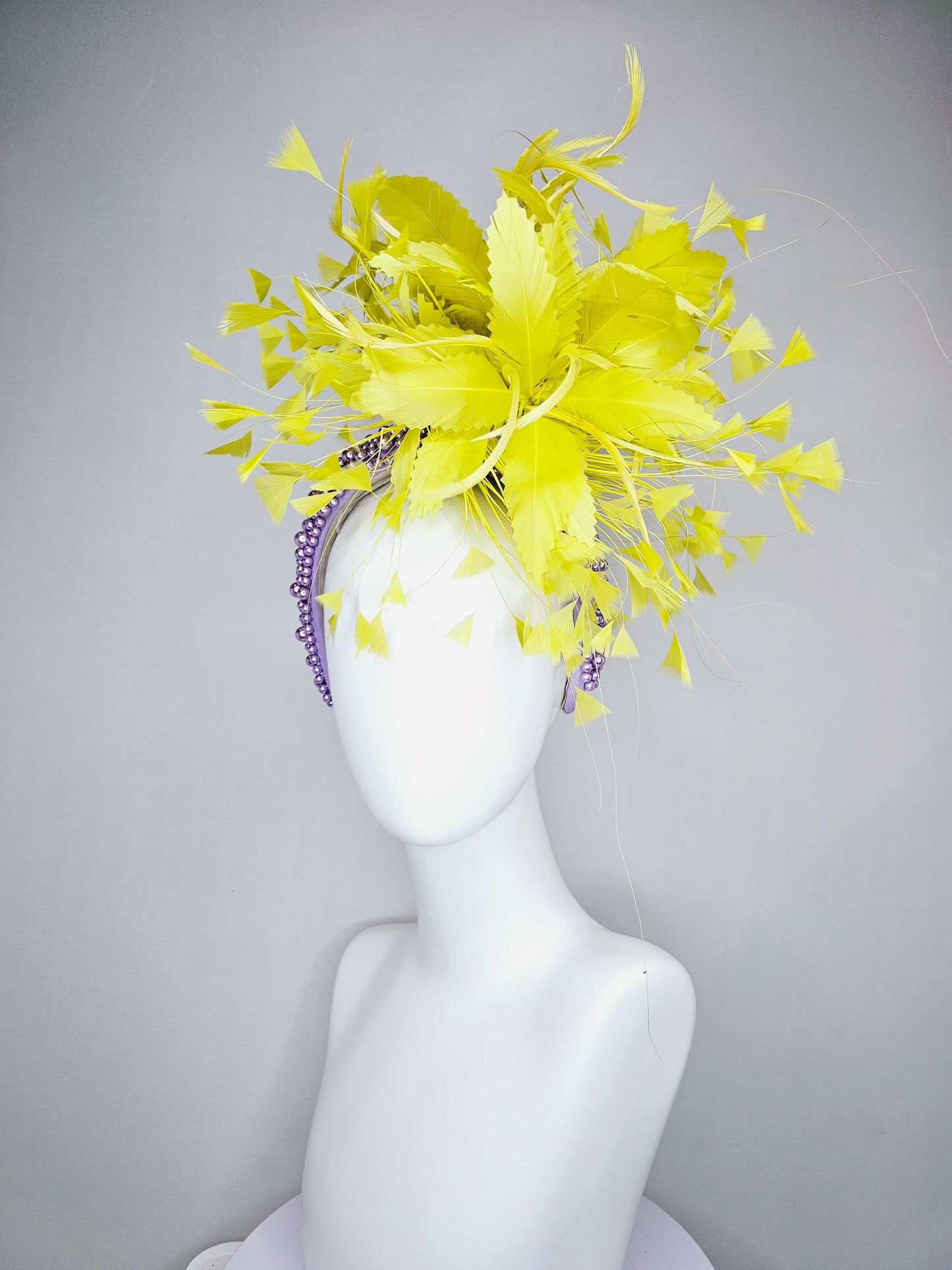 kentucky derby hat fascinator lavender purple pearl beaded headband with bright yellow feather flowers and branching yellow feathers