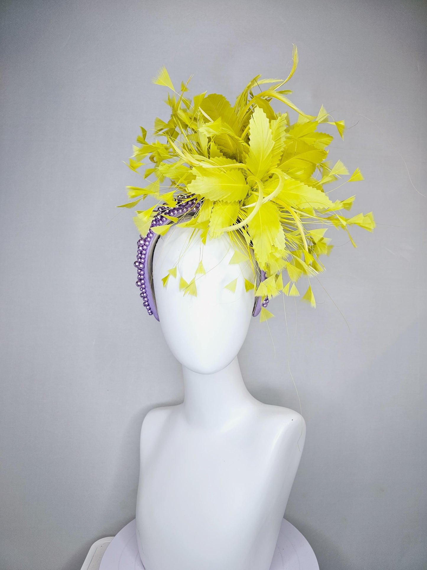 kentucky derby hat fascinator lavender purple pearl beaded headband with bright yellow feather flowers and branching yellow feathers