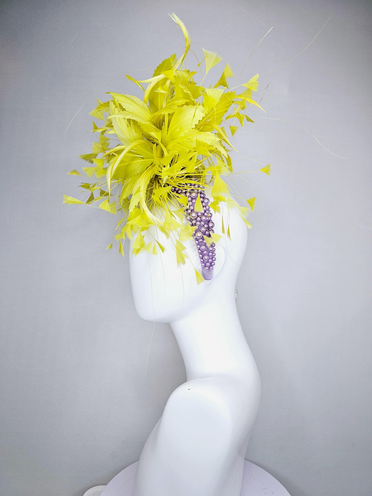 kentucky derby hat fascinator lavender purple pearl beaded headband with bright yellow feather flowers and branching yellow feathers