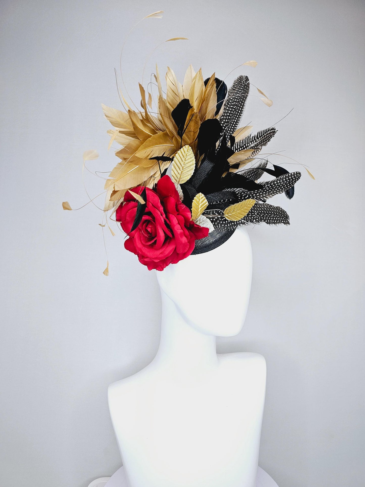 kentucky derby hat fascinator black sinamay base with red rose and beige tan and black feathers,bright gold leaves, with pheasant feathers