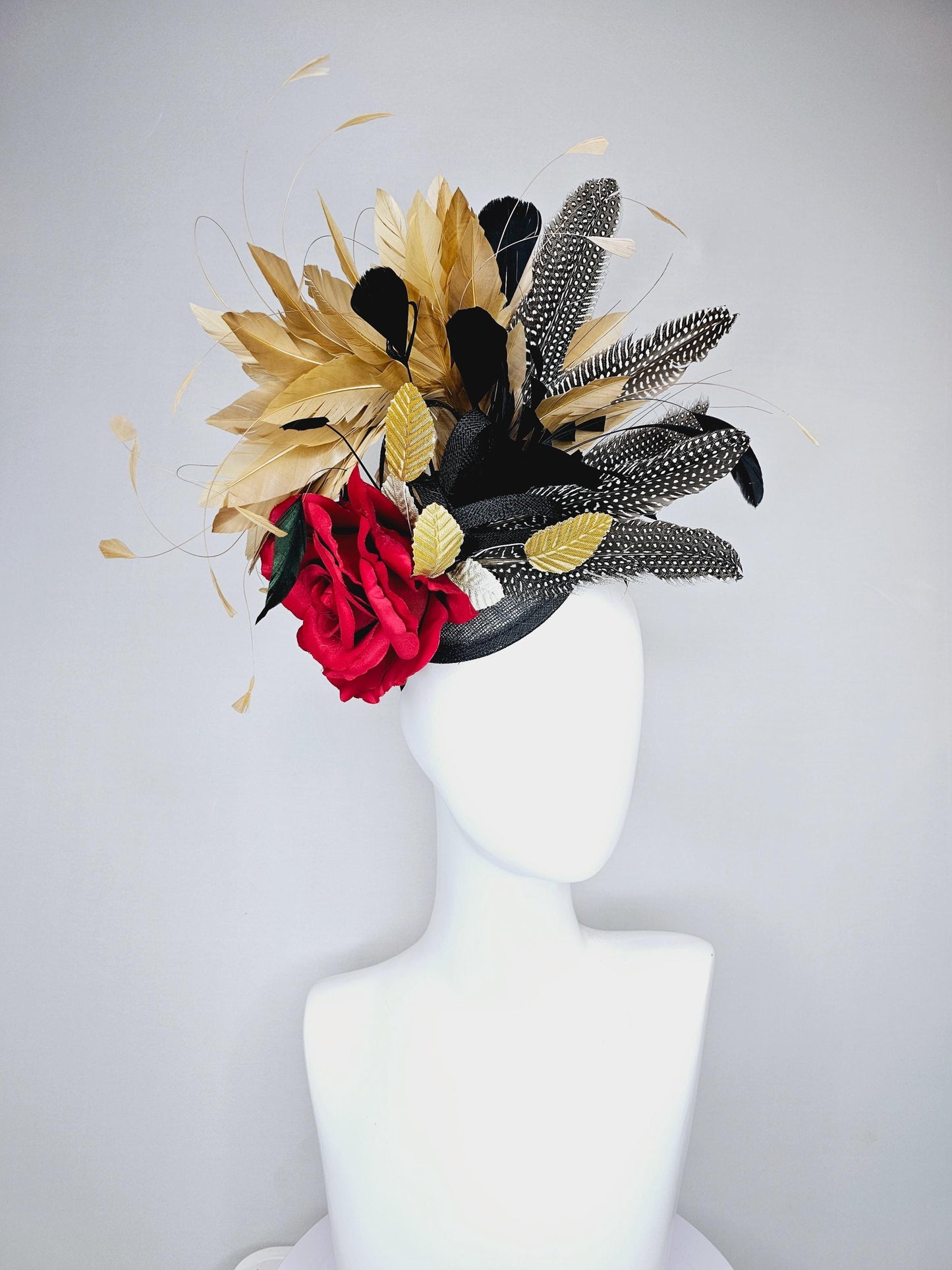 kentucky derby hat fascinator black sinamay base with red rose and beige tan and black feathers,bright gold leaves, with pheasant feathers