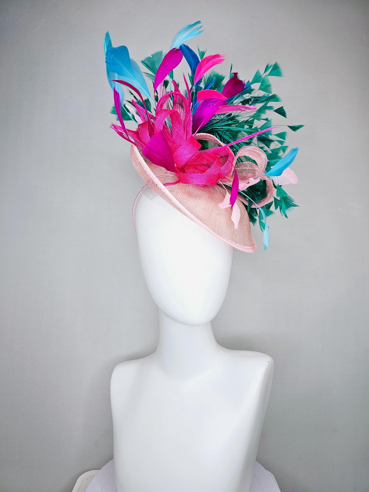 kentucky derby hat fascinator light pink sinamay saucer with curls and with colorful bright fuchsia hot pink,green, blue branching feathers