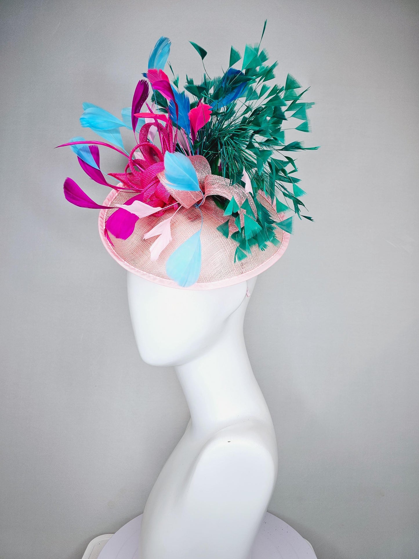 kentucky derby hat fascinator light pink sinamay saucer with curls and with colorful bright fuchsia hot pink,green, blue branching feathers