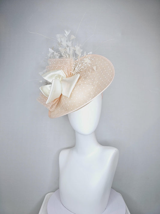 kentucky derby hat fascinator tan beige polka dot sinamay saucer, ivory silk bow with pearl core and branching ivory feathers w/ pearl stems