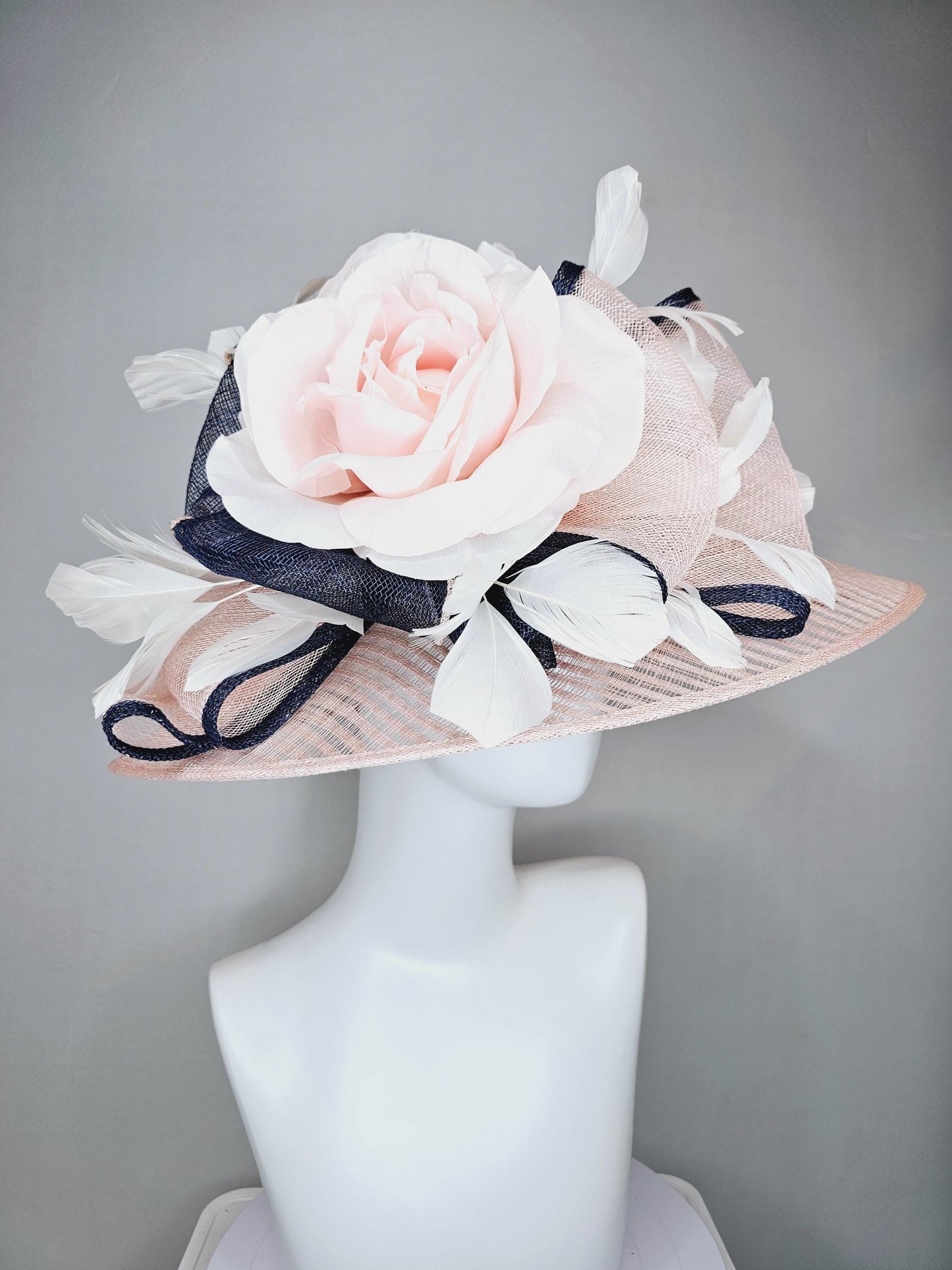 kentucky derby hat wide brim light dusty pink sinamay with light pink silk satin rose,black sinamay details and ivory branching feather