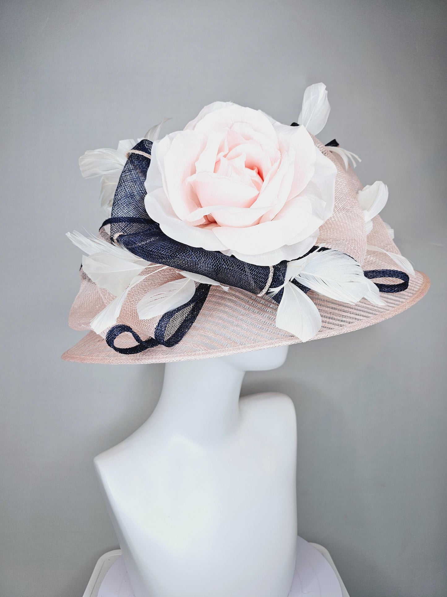 kentucky derby hat wide brim light dusty pink sinamay with light pink silk satin rose,black sinamay details and ivory branching feather