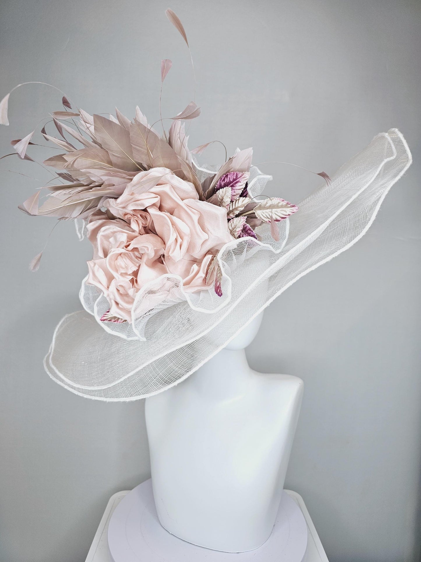 kentucky derby wide brim white ivory sinamay hat with large champagne blush rose silk satin flower,beige tan feathers and purple tan leaves