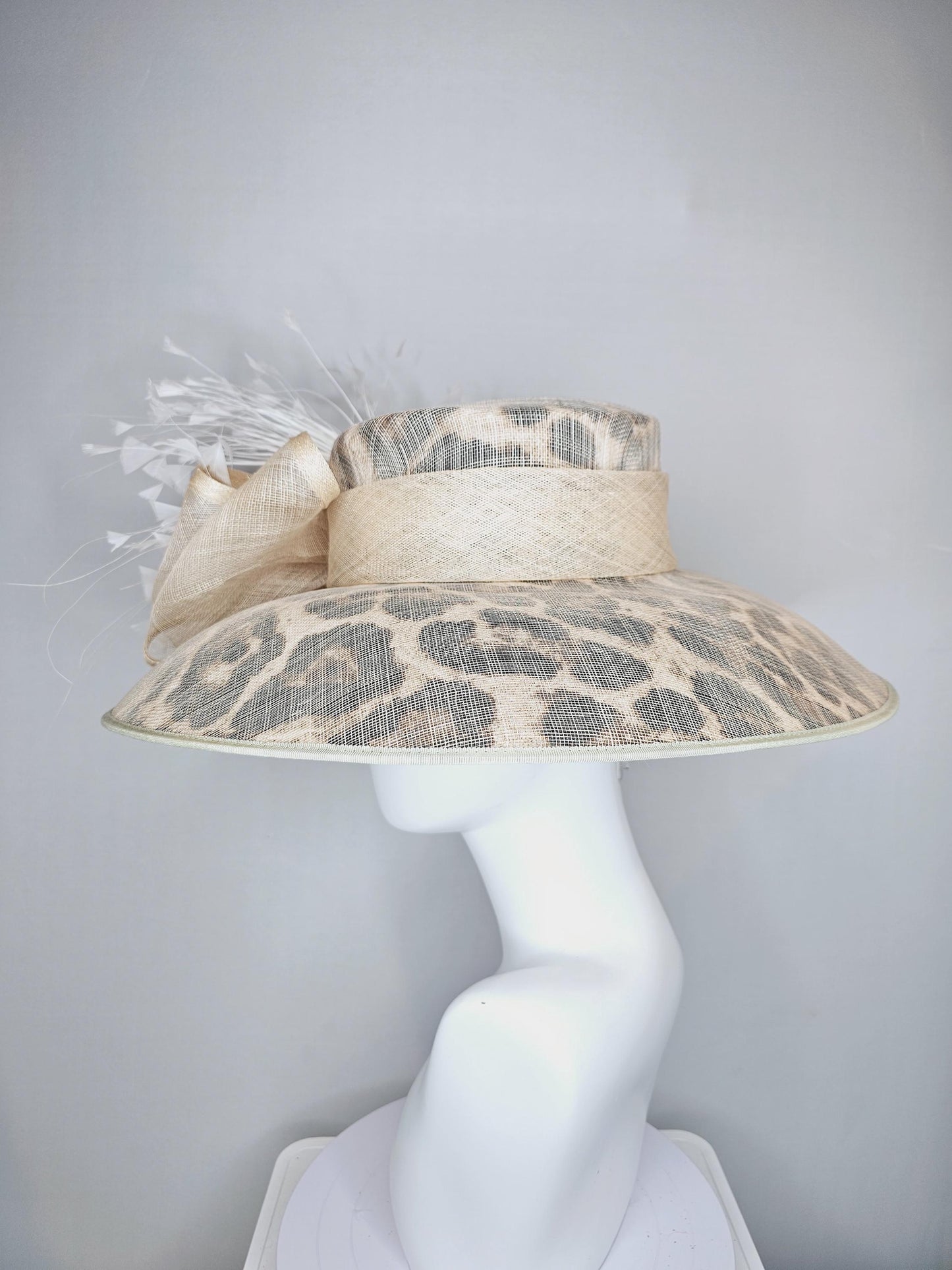 kentucky derby hat large wide brim sinamay neutral taupe beige leopard print hat with pink roses,green leaves, and white branching feathers