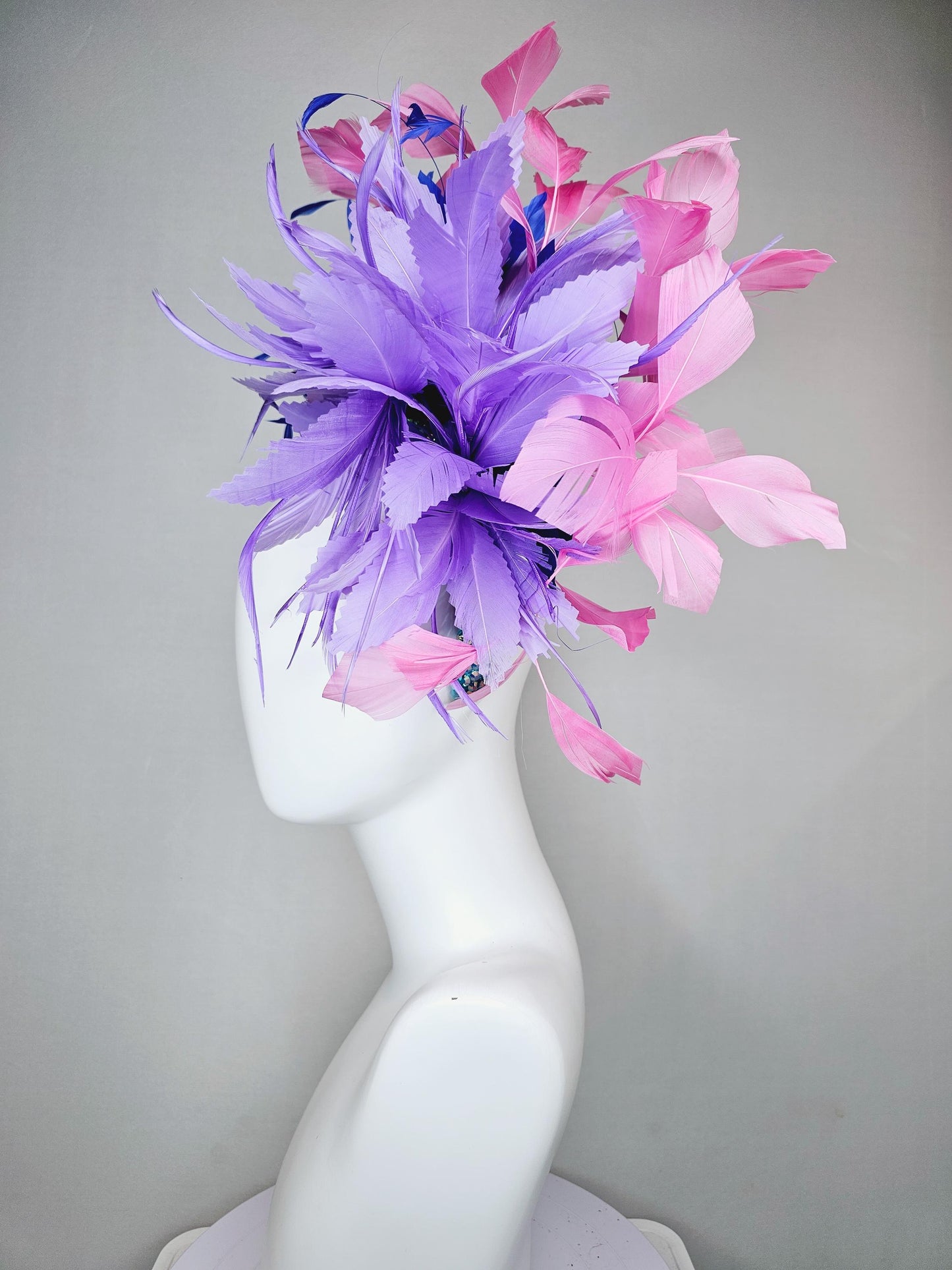 kentucky derby hat fascinator branching pink,royal blue,and purple lavender feathers on iridescent Swarovski crystal turquoise blue headband