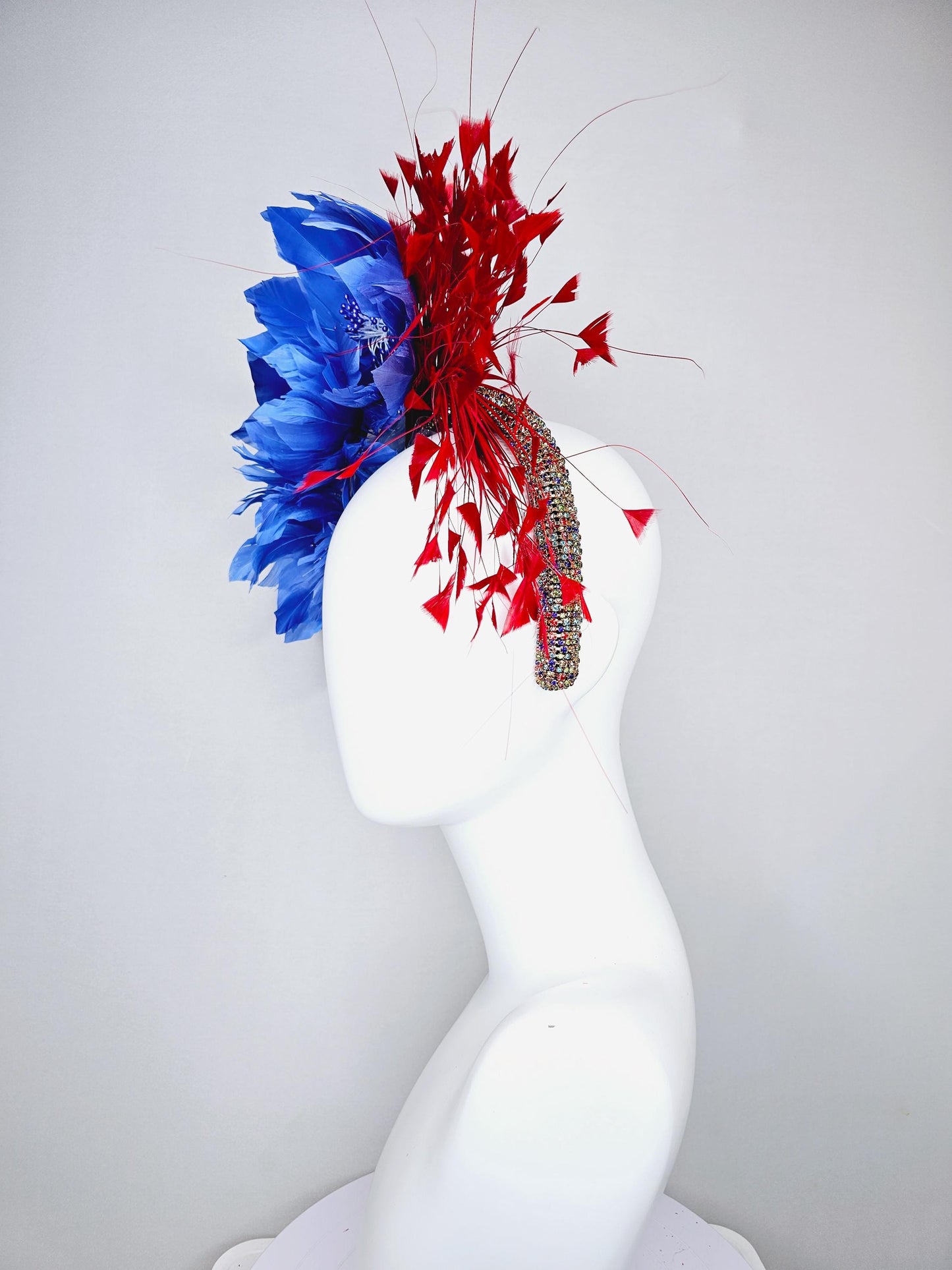 kentucky derby hat fascinator rainbow colorful crystal rhinestone headband with cobalt royal blue feather flowers and branching red feathers